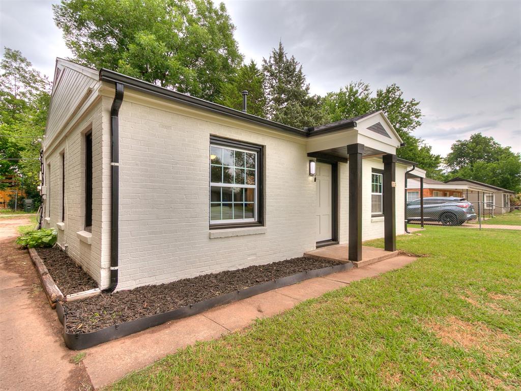 Welcome to this beautifully renovated cottage-style home in the heart of Norman! Thoughtfully updated from the inside out, this move-in ready 2-bedroom, 1-bath home blends timeless charm with modern luxury finishes. Step inside to a freshly painted interior featuring marble-look tile flooring throughout, newer windows, updated hardware, and a bright, clean design that makes the home feel fresh and inviting. The kitchen showcases quartz countertops, stainless steel stove, updated fixtures, and a stylish modern finish that adds both function and elegance. The primary bathroom is a true standout, offering a beautifully tiled shower, new vanity, new fixtures, and a sleek design that gives the home an elevated, spa-like feel.Major improvements add even more value, including a new roof, updated HVAC and furnace system, refreshed exterior, and quality updates throughout. Enjoy a spacious front and backyard, along with a side patio that is great for relaxing, entertaining, or creating your own outdoor retreat. Whether you are searching for your first home, a low-maintenance owner-occupied property, or an investment opportunity near OU, this home offers excellent versatility. Located approximately 1.8 to 2 miles from the University of Oklahoma campus, near shopping, dining, schools, and the continued growth of central Norman. Don’t miss out on the opportunity to own this beauty, schedule your private showing today!