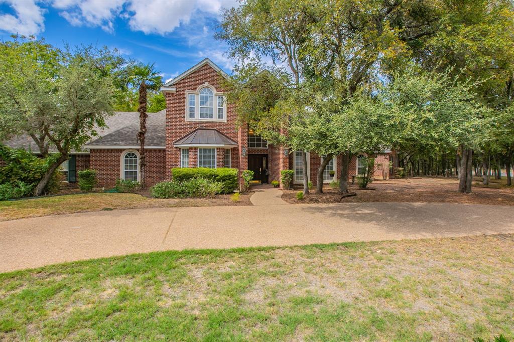 Privacy and seclusion await on the highly sought location.......just under one acre in Hidden Valley with a wonderful covered patio, inground pool all with a view of the woods.  Upon entry you are welcomed with warm hardwood flooring and a formal dining.  The expansive living area opens up with a wall of windows overlooking the pool.  The kitchen sparkles with an island, walk in pantry, double oven, breakfast eating bar and separate eating area.  Downstairs is the expansive owners suite offering a view of the pool, spectacular bath with separate shower, whirlpool tub, walk in closet and dual vanity.  To complete the downstairs is the 4th bedroom or office along with a full bath.  Upstairs there are 2 very spacious bedroom with a full bath.  Just at the landing of the stairs is a private reading area with bookshelves.  Don't miss the half bath just off the patio by the pool!!  And, it has central heat and air.  To finish the beautiful package is a 3 car attached garage!!  Fresh paint and carpet in September 2026!  Please remove shoes when entering, thank you!!!