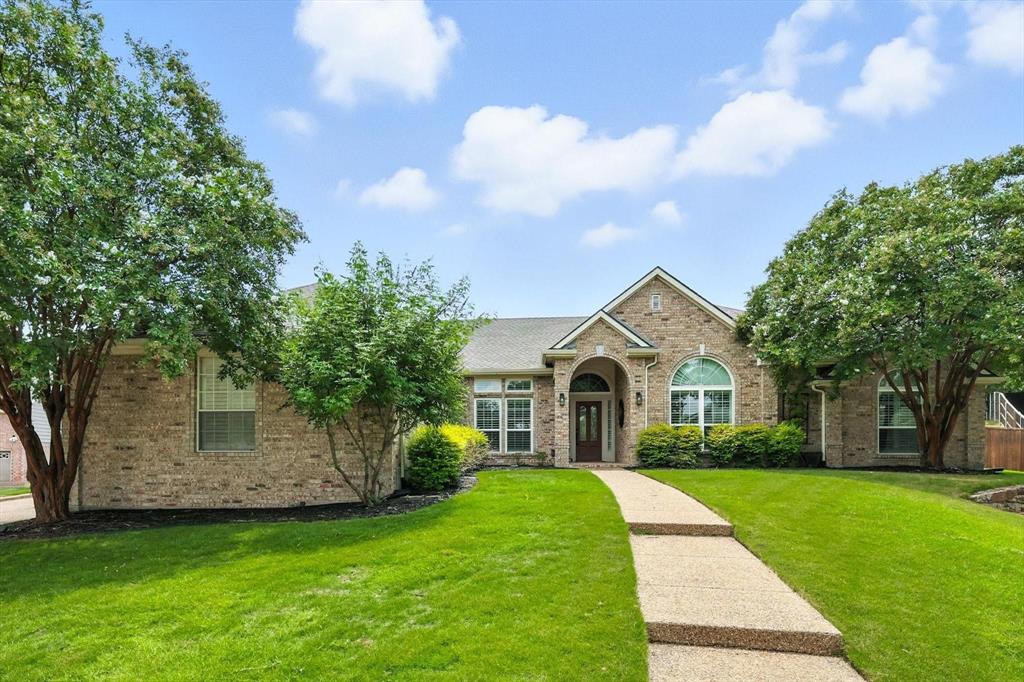 Tucked at the end of a quiet cul-de-sac in the sought-after Stone Creek community, this stunning single-story ranchhome sits on nearly half an acre, offering privacy, space, and style. A rare 3-car garage, mature landscaping, andtimeless curb appeal set the tone for what’s inside. The open-concept floor plan is both functional and flexible,featuring multiple living and dining areas perfect for entertaining or everyday living. At the heart of the home is aspacious kitchen with expansive countertops and an enormous butler’s pantry—ideal for hosting and storage.Generously sized guest rooms offer plenty of space for family or visitors, and neutral finishes throughout the homeprovide a fresh, move-in-ready feel. The private primary suite is tucked at the rear of the home and feels like a trueretreat, boasting a beautifully updated bathroom with striking tilework, a seamless glass walk-in shower, freestandingsoaking tub, and modern double vanity. Charming character shines throughout with features like a shiplap fireplace,wood accent walls, hardwood flooring, and plantation shutters. Enjoy the convenience of being minutes from Frisco'sbest shopping and dining, all while benefiting from top-rated Prosper ISD schools. This home combines comfort, style,and location—a true gem in Stone Creek.