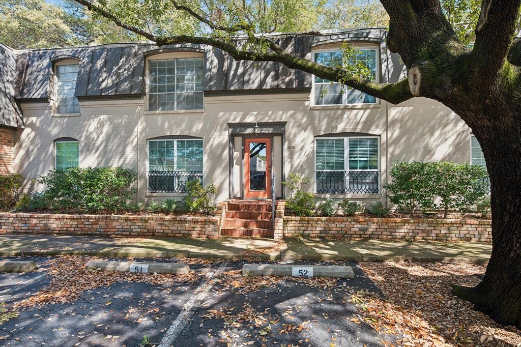 2 assigned parking spaces * Gated community with pool * 0.4 mi to Inwood-Love Field Station *Second-floor 2 bedroom, 2 bathroom condo in the gated Greenbriar Place community offering over 1,000 square feet with an open living and dining layout and recently installed luxury vinyl plank flooring. A large front window fills the living area with natural light and overlooks mature trees, while built-in shelving provides functional storage and display space.The kitchen features granite countertops, stainless steel appliances, a breakfast bar, and a herringbone tile backsplash. All appliances convey, including the refrigerator. Laundry connections for a stacked washer and dryer are located in the hallway utility closet.The split-bedroom layout provides separation between bedrooms. The primary suite includes an ensuite bathroom with a walk-in shower and marble surround. A second bedroom and full bathroom with a deep soaking tub and shower combination are located on the opposite side of the condo. Carpet has just been installed in both bedrooms.Greenbriar Place is a gated condominium community with mature landscaping, assigned parking, and a community pool. The HOA provides exterior maintenance, grounds maintenance, water, sewer, trash, pest control, and insurance, allowing for simplified ownership and maintenance.Leasing is permitted with a minimum lease term of 30 days; short-term leasing is not allowed.Residents are permitted a maximum of 2 pets per unit; each pet must not exceed 30 lbs, dangerous breeds are prohibited.Located approximately 0.5 miles from UT Southwestern Medical Center and about 0.4 miles from Inwood-Love Field Station with access to DART rail service. Dallas Love Field Airport is approximately 2.6 miles away. The property also offers convenient access to the Medical District, Oak Lawn, Cedar Springs, Maple Avenue, and nearby dining, shopping, and commuter routes.Floor plan included with listing to help visualize the layout.