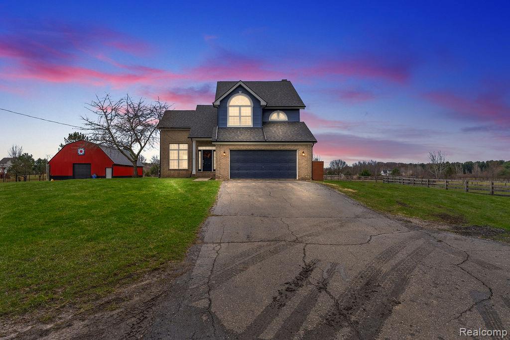 Super Cute Hobby Farm in Davison on 10 acres! This wonderfully maintained home features 3 bedrooms, 2.5 baths and an unfinished basement. The home includes many updates; new roof 2023, new siding (home and pole barn) 2023,  roof 2023, backsplash 2026 , new shower in the primary's bathroom 2025, solar panels 2025, new furnace and AC 2024 , new flooring carpet 2021, and a total remodel in 2021. The property is currently set up for horses (or other livestock). There is a 30x60 hay barn, 16x12 chicken coop, 12x40 shedrow that features (3) 10x12 stalls and a 10x12 feed/tack room, 20x12 lean-to , 30x 45 pole barn, 2 auto-waterers, as well as an outdoor arena.