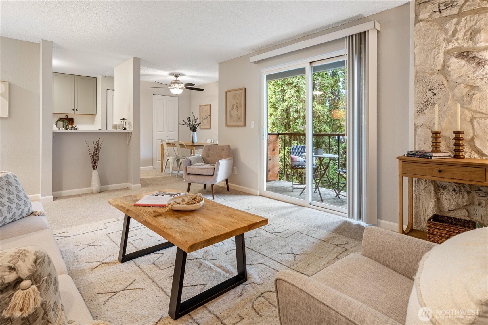 Welcome to this beautifully renovated home featuring a brand-new kitchen with a breakfast bar that opens seamlessly to the living and dining areas—ideal for entertaining. Step outside to a private balcony, perfect for enjoying fresh air and morning coffee. Tucked down the hall away from the main living spaces, you’ll find an updated bath, a spacious primary bedroom with a walk-in closet, and a second bedroom that completes the comfortable, well-designed floor plan. Additional highlights include in-unit washer and dryer, a dedicated parking space, new carpet and fresh paint throughout, and access to a swimming pool. Enjoy an easy commuter location close to the Interurban Trail, Lake Ballinger, Costco, and a variety of dining options.