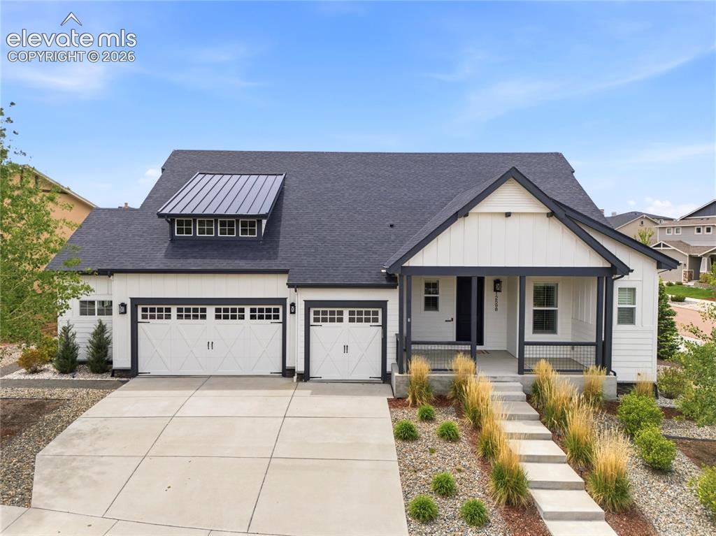 The Best of the Best, refined luxury, manageable size, extreme in style & design! Impressive upgrades, exceptional offering in desirable Flying Horse Country Club Community * Built by Goetzmann Custom Homes, attention to every detail is apparent * Mountain Modern vibe from the curb sets the tone for exciting interior finishes * Expanded, covered entry with custom railing is a great place to relax & take in the sunsets * Once inside, gorgeous hardwood floors flow throughout the entire main level * Inviting great room features soaring vaults, stylish beams, custom lighting & floor-to-ceiling stone fireplace complemented by a striking shiplap accent wall * Kitchen impresses with a 5-burner gas cooktop, double ovens, stately vent hood, quartz countertops, brick backsplash, expansive island/breakfast bar & huge walk-in pantry * Light-filled dining space walks out to covered & uncovered patios, seamless for indoor-outdoor entertaining * Office boasts 8’ French doors, awesome work-from-home space * Primary retreat showcases 12’ ceilings, abundant windows, ceiling fan & spa-inspired 5-piece bath enhanced by the soaking tub, double quartz vanity, custom tile flooring, walk-in shower with pebbled tile floor & walk-in closet with custom built-ins for maximum functionality * Second main-level bedroom has ensuite full bath, perfect guest quarters * Finished basement offers 9’ ceilings, focal gas fireplace, spacious family room, billiard space, wet bar with quartz counters & beer tap, two additional bedrooms with generous walk-in closets & adjacent full bath * Unfinished flex space allows for future expansion * Enjoy exceptional outdoor living with a natural gas fire pit as a bonus * Tesla solar panels & charging station included * Walk to The Club at Flying Horse * Near District 20 Schools & all the new amenities in Northern Colorado Springs * Flying Horse Country Club has 2 championship golf courses, pools, tennis, fitness, spa, hotels & restaurants! Opportunity & VALUE galore!