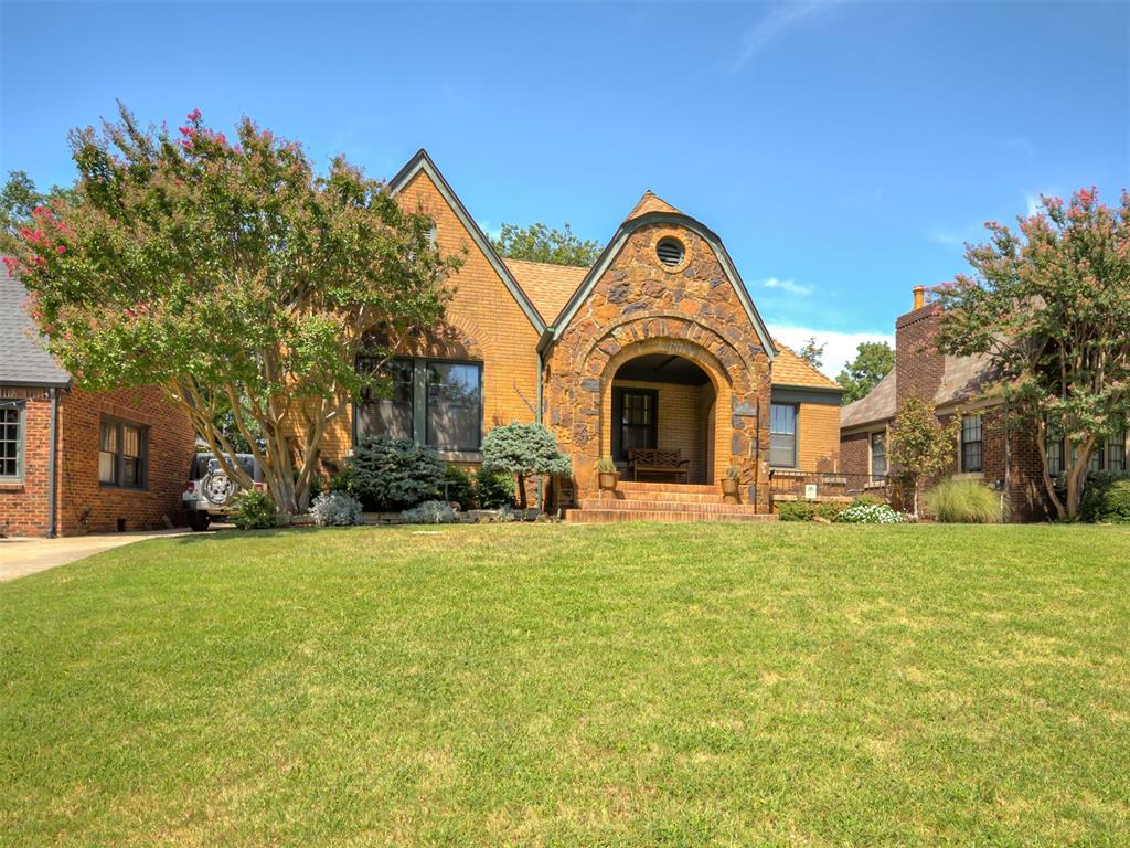 Classic 1934 character meets thoughtful updates in this beautifully maintained Urban Core home. Original wood floors, glass doorknobs, a charming hallway telephone nook and preserved vintage tile add the kind of personality you simply can’t recreate. The updated kitchen pairs new countertops and a workstation sink with new cabinetry featuring drawers, pull-out shelving and a generous pantry area designed for practical everyday storage. Vintage details continue in the hall bath with the original tub and tile floor, an updated vanity and oversized linen storage, while the remodeled primary bath retains its original tile floor. A finished basement provides flexible bonus space for a media room, home office, workout area or additional living space. Outside, enjoy mature landscaping, a new deck and a genuinely parkable 2-car garage. Located in a Historic District Preservation area with a neighborhood park and walking trails nearby, plus easy access to The Paseo, Western Avenue District, UpTown 23,  locally owned restaurants and shopping. A wonderful combination of historic charm, usable space and one of OKC’s most loved urban settings.
