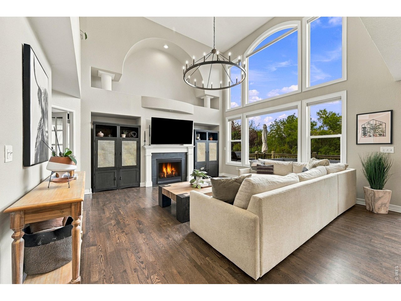 Most homes at this price point in Indian Peaks ask buyers to take on the next round of updates themselves. This one has already done it for you! More than $100,000 in high-end upgrades since 2021 include premium Sub-Zero, Wolf and Bosch appliances, new and upgraded mechanical systems, new lighting, oak flooring, fresh paint and more. ***Backing to community green space in the distinctive Starlight Ridge neighborhood of Indian Peaks, this 4-bedroom, 4-bath two-story home offers 4,500 finished square feet and is move-in ready. Gleaming hardwood floors lead to an impressive family room where soaring ceilings, abundant natural light and a cozy gas fireplace create an immediate sense of arrival. An adjoining office provides a convenient work-from-home space. ***The chef's kitchen pairs custom cherry cabinetry and an elegant piano-shaped island with premium appliances designed for both serious cooking and everyday convenience. Upstairs are three bedrooms, including a spacious primary suite with spa-style bath, plus two additional bedrooms and an oversized, bedroom-size laundry/bonus room. ***The finished basement sets this home apart, featuring a custom wine-tasting room, wet bar with dual beverage refrigerators, recreation room, and a fourth bedroom with its own bath-all freshly painted in 2026. ***Outside, enjoy a fully fenced backyard with raised garden bed, updated irrigation and direct views of the neighborhood green space. A 3-car garage rounds out the package. A network of neighborhood parks, including the regional Waneka Lake Recreation Area, is within walking distance. ***Served by highly regarded Boulder Valley schools and just minutes from Old Town Lafayette and Louisville, this is turnkey living in one of Lafayette's most desirable communities. Homes that sparkle like this don't come along often. Showings begin Thursday, 9/17-schedule your visit today!