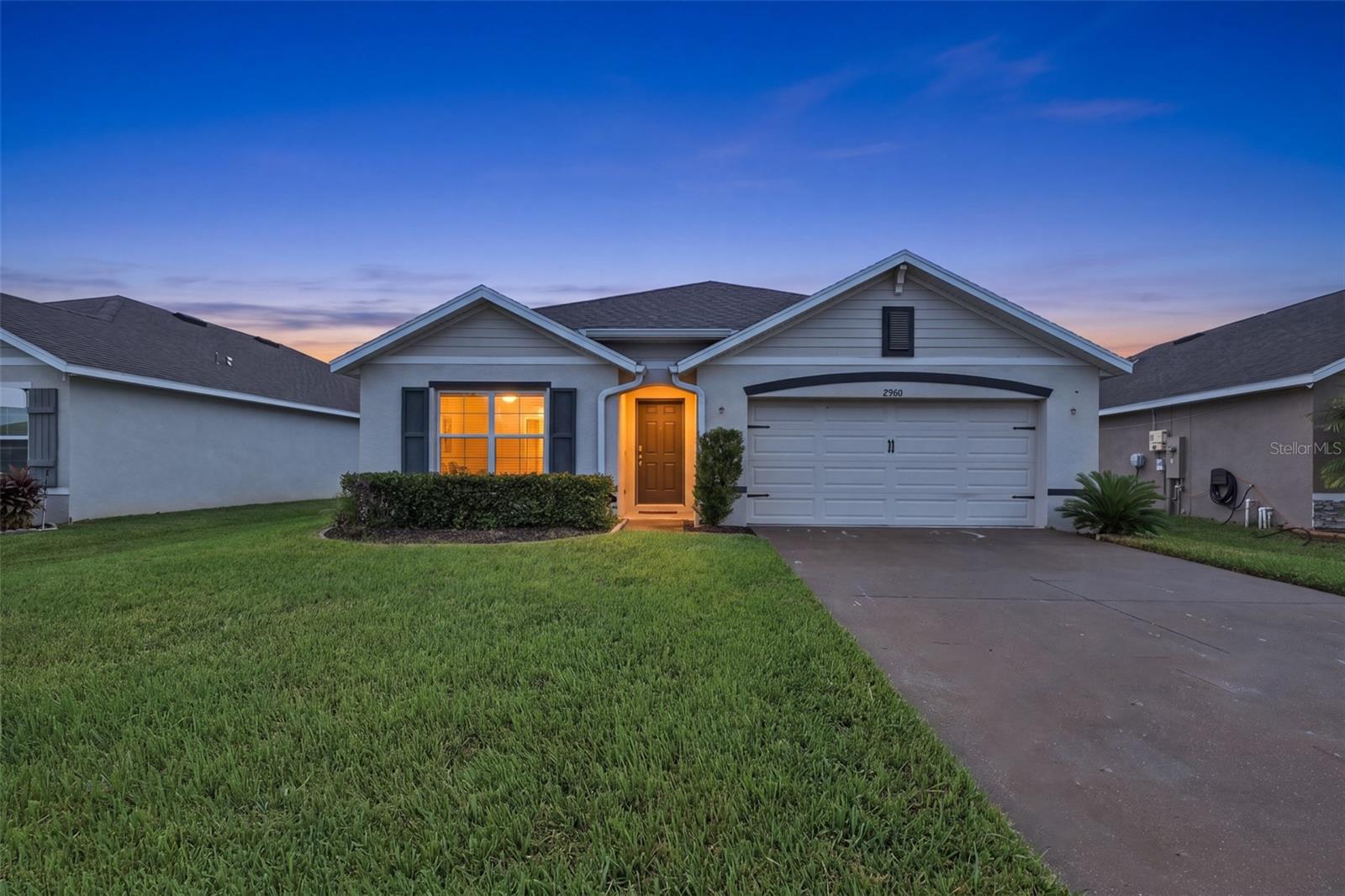 WELCOME HOME! This beautifully maintained 4-bedroom, 2-bath home in the desirable Abbott Park community of Zephyrhills is truly move-in ready! Offering modern comfort, energy efficiency, and a fantastic location, this home is designed for both everyday living and entertaining. Step inside to a bright, open floor plan with fully tiled flooring throughout. The spacious living area is filled with natural light and flows seamlessly into the well-appointed kitchen, featuring ample cabinetry, a walk-in pantry, granite countertops, a large island with a deep custom sink, stainless steel appliances, and convenient seating at the island. The spacious primary suite provides a private retreat with a luxurious ensuite bathroom featuring dual sinks and a walk-in closet. The desirable split-bedroom layout offers added privacy for family and guests. Through the sliding glass doors, step outside to your covered lanai, the perfect spot to enjoy your morning coffee or relax after a long day. The fully fenced backyard with no rear neighbors provides plenty of room for entertaining, gardening, or letting your two or four legged family members enjoy the outdoors. Abbott Park offers wonderful community amenities, including a resort-style pool, playground, dog park, and open-air clubhouse. Even better, high-speed internet and Wi-Fi are included in the HOA! Conveniently located just off US 301, you'll have easy access to Tampa, Lakeland, and Orlando, as well as Tampa International and Orlando International Airports. Enjoy being just minutes from shopping, dining, medical facilities, entertainment, and so much more. BONUS: THIS PROPERTY IS ELIGIBLE FOR USDA 100% FINANCING! If you're looking for a move-in-ready home with great amenities, a private backyard, and an unbeatable location, this one is a must-see!