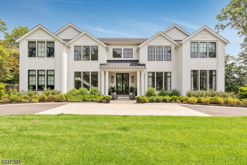 Nestled among the most magnificent properties in Westfield, this two-year-old custom-built residence offers unparalleled luxury and sophisticated living inone of New Jersey's most desirable neighborhoods.Boasting 5 spacious en-suite bedrooms and 7 and half beautifully appointed bathrooms, this stunning estate blendstimeless elegance with modern design. Every inch of this 8,500+ sq. ft home has been thoughtfully crafted with top-of-the-line materials and meticulous attention todetail, ensuring both comfort and grandeur. 5 en-suites each offer expansive bedrooms, custom finishes, sumptuous closet space, & private full bathrooms. Chef'skitchen with high-end appliances (Blue Star, Subzero, Cove, Wolfe), custom cabinetry, and expansive islands, perfect for both intimate meals and large gatherings.Impressive formal living room and dining area that showcase the home's airy open floor plan. Basement complete with a home theater, state-of-the-art gym, a luxuriousentertaining kitchen, and an office/playroom. An elegant screened in heated porch with gas fireplace opens up to the private backyard oasis with heated pool, built-ingrilling area, fire pit lounge, and pool house (with kitchen and bathroom)" ideal for entertaining or easy daily living. A temperature controlled 3-car garage offers amplespace for vehicles, storage, and access to the basement level and lower level laundry/mudroom with radiant heated floors. This extraordinary property is not just ahome, it's a lifestyle.