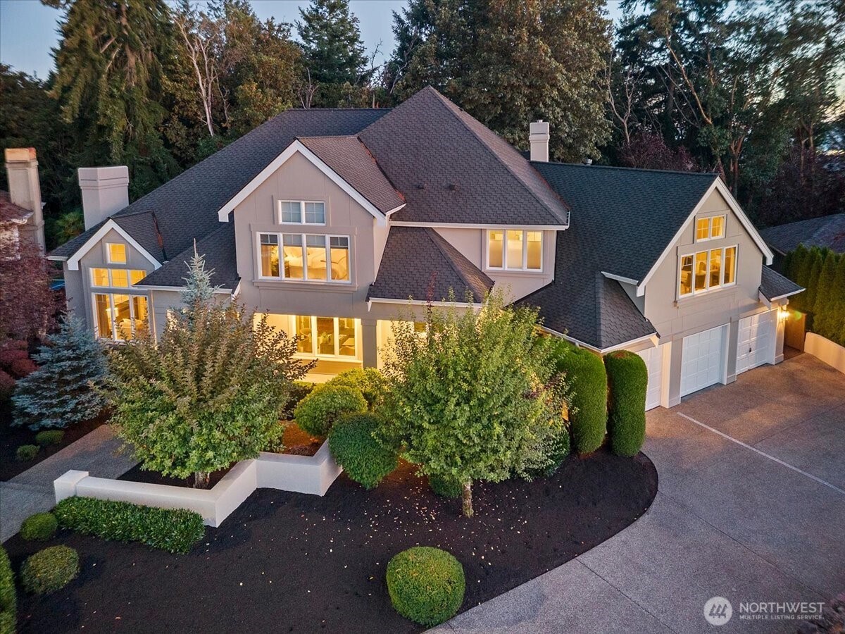 Stunning, elegant, and meticulously maintained, this exceptional cul-de-sac home enjoys a private setting against a lush, protected greenbelt just minutes from the Golf Club at Newcastle, Coal Creek YMCA, parks, shopping, and major commuter routes. A spacious, light-filled floor plan offers an effortless flow between formal and casual living spaces, ideal for everyday living and entertaining.    At the heart of the home, the expansive gourmet kitchen is thoughtfully appointed with slab granite countertops, rich cherrywood cabinetry, generous prep and gathering spaces, and premium appliances that include a Thermador commercial fridge, Viking cooktop, Viking double ovens, and a large wine cooler. Spacious living areas continue throughout with four bedrooms, a main-floor den, versatile bonus room, oversized secondary bedrooms, two fireplaces, and dual staircases that add both architectural interest and convenience.    Outdoors, the beautifully landscaped, level backyard feels like a private retreat. An expansive Azek deck provides an ideal setting for outdoor dining and entertaining, while the native-protected greenbelt creates a peaceful backdrop with exceptional privacy.    Recent upgrades include a newer furnace, A/C unit, & hot water tanks. Other features include a sprinkler system and spacious 3-car garage. Located within the sought-after Issaquah School District and close to Newcastle Golf Course, Cougar Mountain recreation, shopping, dining, and convenient freeway access.