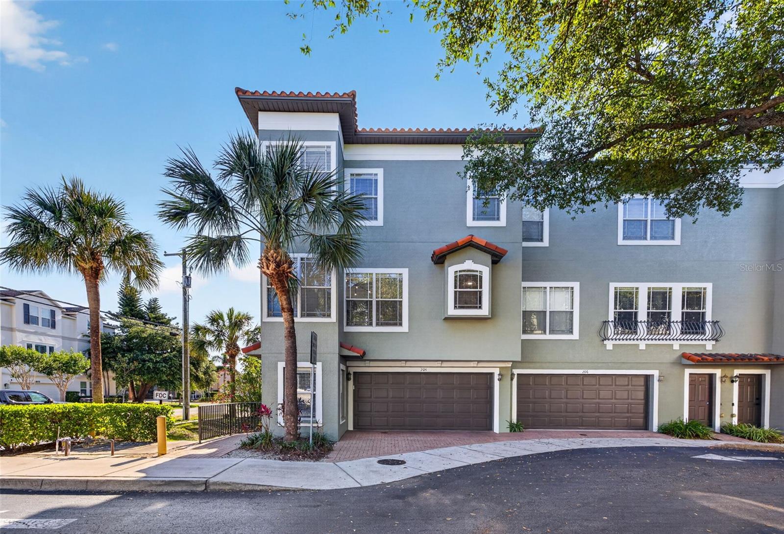 Welcome to South Tampa Living! This tucked-away, beautifully updated 2-bedroom, 2.5-bath Las Villas townhome is conveniently located in the heart of South Tampa. This rare end-unit townhome features a two-car garage and offers an abundance of natural light as soon as you enter the front door. Grady/Coleman/Plant school districts. Major updates include a brand-new AC unit (2025), a new water heater (2024), and new flooring installed in 2021, along with a remodeled primary shower and California Closets throughout the home, including the garage. On the second floor, you’ll find a beautiful kitchen with tall cabinets and ample storage. The main living area features an open floor plan filled with natural light, 9.5-foot ceilings, crown molding, and fresh paint that creates a clean, open feel.The third floor includes both bedrooms, including the primary bedroom with a large, custom-designed walk-in closet. The primary bathroom offers dual sinks and a remodeled shower.Location, location, location! Enjoy effortless South Tampa living with top dining, shopping, and entertainment just minutes from your door—making everyday life as convenient as it is enjoyable. Schedule your showing today!