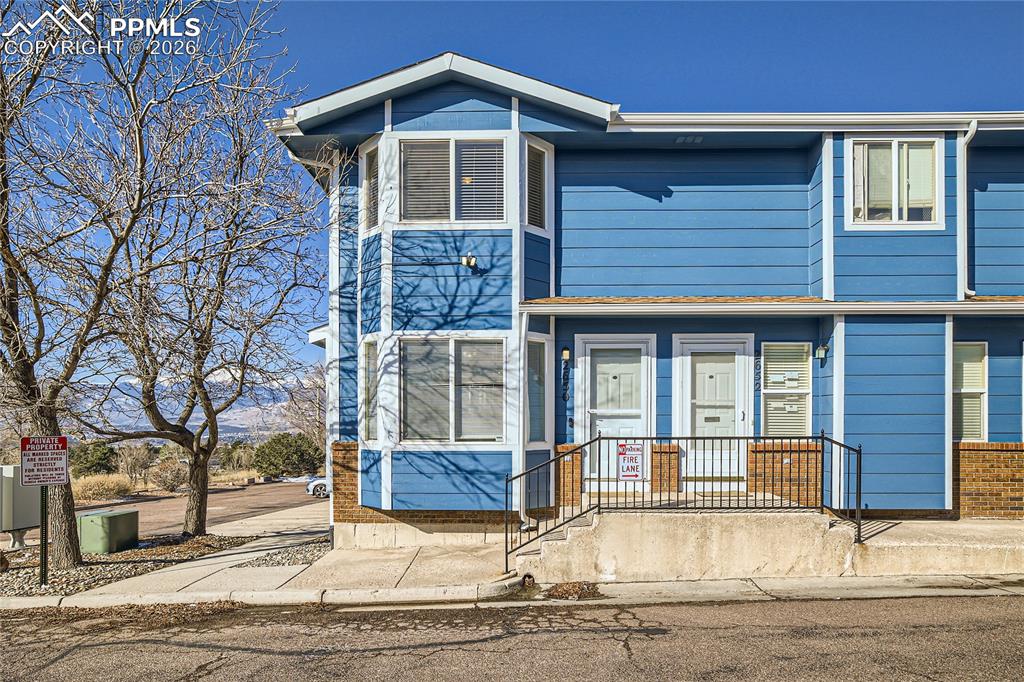 Looking for an affordable option with a view of Pikes Peak?  Look no further * Step into charm and character with this delightful San Francisco–style townhome, thoughtfully designed to blend timeless appeal with modern updates * Main level flows nicely with large great room and adequate dining space * The signature bay windows in both the living room and primary bedroom flood the home with natural light and the primary suite showcases panoramic views of the city lights and majestic Pikes Peak, giving the residence the feel of a private, stand-alone home * The kitchen walks out to private decking, great for evening barbecues * Enjoy the coveted south-end location of this unit which allows for abundant passive solar gain, creating a warm, sunny, and cheerful atmosphere throughout the property, including the inviting garden-level basement * Abundant, newly refinished wood floors flow seamlessly throughout the main level, highlighting the home’s craftsmanship * Newer interior paint is neutral and ready for your color palette * Stylish fixtures and thoughtful finishes bring a crisp, updated look which will dramatically enhance the value long term * The quiet setting offers a sense of calm while still providing convenience with a nearby open-space and walking path perfect for morning strolls or evening jogs * Whether relaxing with a book in the light-filled bay window nook, entertaining in the open main level, or simply admiring the ever-changing mountain views from your primary suite, this home delivers comfort, character and a carefree lifestyle that makes homeownership easy and affordable * Look here now, this home will not disappoint...