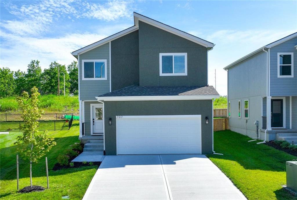 Why wait to build when you can move into this sleek, move-in-ready Magnolia 2-story by Avital Homes today? Priced $14,000 below reproduction cost and with a big limited-time builder promotion included, this exceptional new construction home offers luxury finishes, modern design, and one of the best values in Creekmoor and the surrounding Raymore area.  Situated on a quiet cul-de-sac with no rear neighbors, this almost 2000sqft 4-bedroom, 3.5-bath home combines privacy, comfort, and convenience. The open main level features beautiful wood flooring and a layout that invites your furnishing and decor creativity and your social connections. The open kitchen showcases quartz countertops, stainless steel appliances, bright cabinetry, abundant natural light, and an oversized walk-in pantry that can accommodate groceries and small appliances alike. Upstairs, two secondary bedrooms share a large double-vanity bathroom with shower/tub combo, while a third bedroom enjoys its own private full bathroom that is perfect for guests, multi-generational living, or a home office. The generous primary suite offers a bright and relaxing bath with dual vanities, quartz countertops, a tiled shower, and oversized linen closet. Enjoy peaceful backyard views with no homes directly behind you, plus a partially fenced yard with additional trees ready for your finishing touches.  Four bedrooms not enough?  Consider having the builder finish the basement with a rec room, 5th bedroom, and 4th full bathroom for a total of 2575 square feet! Located steps from the golf course and just moments from Creekmoor’s resort-style amenities and local shopping, dining, schools, and everyday conveniences. This is a rare opportunity to own a brand-new home with premium finishes, flexible living spaces, and privacy in one of the area's most desirable communities. Schedule your private tour today and experience the value and luxurious lifestyle that this home delivers.