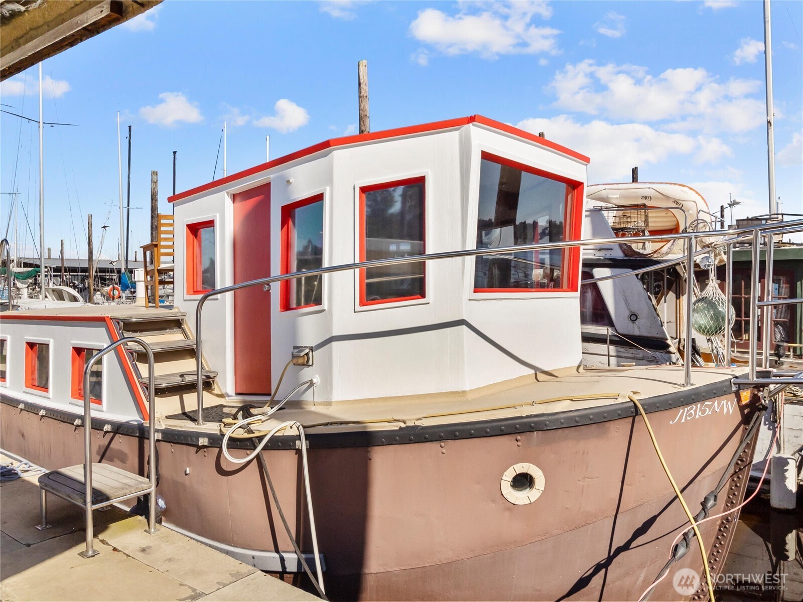 Welcome to this one of a kind 1940 Naval trawler conversion. Enjoy a piece of history surrounded by beautiful views of the capital, bay and nearby wildlife. Located in Olympia's West Bay Marina, this 1 bed 1 bath live-aboard boat would make a fantastic short term rental or a great place to escape for a couple nights! Tugboat Annie's is only steps away, and Oly's waterfront Farmers market and downtown only minutes away- you can't beat this location! Updated exterior paint, new LVP flooring when you first enter the cabin, nice size living space with walk-in pantry/closet. Bask in beautiful sunny days on the topside watching marine life float by. Boat can also be relocated!