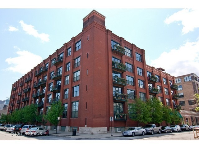 One of a kind, Sky penthouse with fully intact and restored exposed terra cotta tiled ceiling throughout in this 1910 originally built former Nabisco baking plant. Exposed 20' ceiling height, incredible open living, dining and kitchen space with gracious foyer, all real oak hardwood ("tongue and groove") floors through this Residence. Exposed brick, brick and concrete 27' wide terrace which spans the width of the unit accessible from the family room and second bedroom suite. Exposed steel girder and support columns. Central kitchen with large island, 1.25" rare, straight edge granite counters, Built-in cabinetry Panasonic microwave, Kitchen Aid appliance package including French door fridge, dishwasher, 5-burner range and culinary hood. Built-in pantry. Wide stainless steel baseboard around custom contemporary cabinetry. Separate dining, living and family room areas. Gas ventless fireplace. First floor featuring two fully enclosed bedrooms, second with ensuite bathroom with mitered straight edge myriad grey granite stone, rectangular, ivory undercount sinks, wall hung mirrors, contemporary lighting, and wall plumbing fixtures. Dressed in stone, shower and soaking tub with air jets combination. Built-in surround sound speakers. Second first floor full bathroom room with adjacent linen closet, also functions as convenient powder room for guests, dressed in Italian porcelain, elegantly designed wallpaper, frameless glass, rain shower, stand alone furniture piece vanity. Sumptuous primary suite on second level with terra cotta tile ceilings, all wood riser stairs, enormous floor space easily accommodates a California King, two large nightstands, large bureau, highboy and sideboard for additional folded clothing storage. Amazing bathroom with built-out walk in closet, additional walk-in storage for overflow and toiletries and supplies. Rectangular cut marble flooring, dual vanity with mitered edge stone counter, rectangular, ivory under mount sinks, heated floors, shower with bench, steam, rain shower, floor to ceiling stone, hexagon stone shower basin. Deeded, heated parking within the same building, PD-52, included in the list price. 1000 West is in the heart of the West Loop and steps to all of its splendor of restaurants, retail, shopping, grocery, nightlife, etc. Residence 517 will not disappoint.