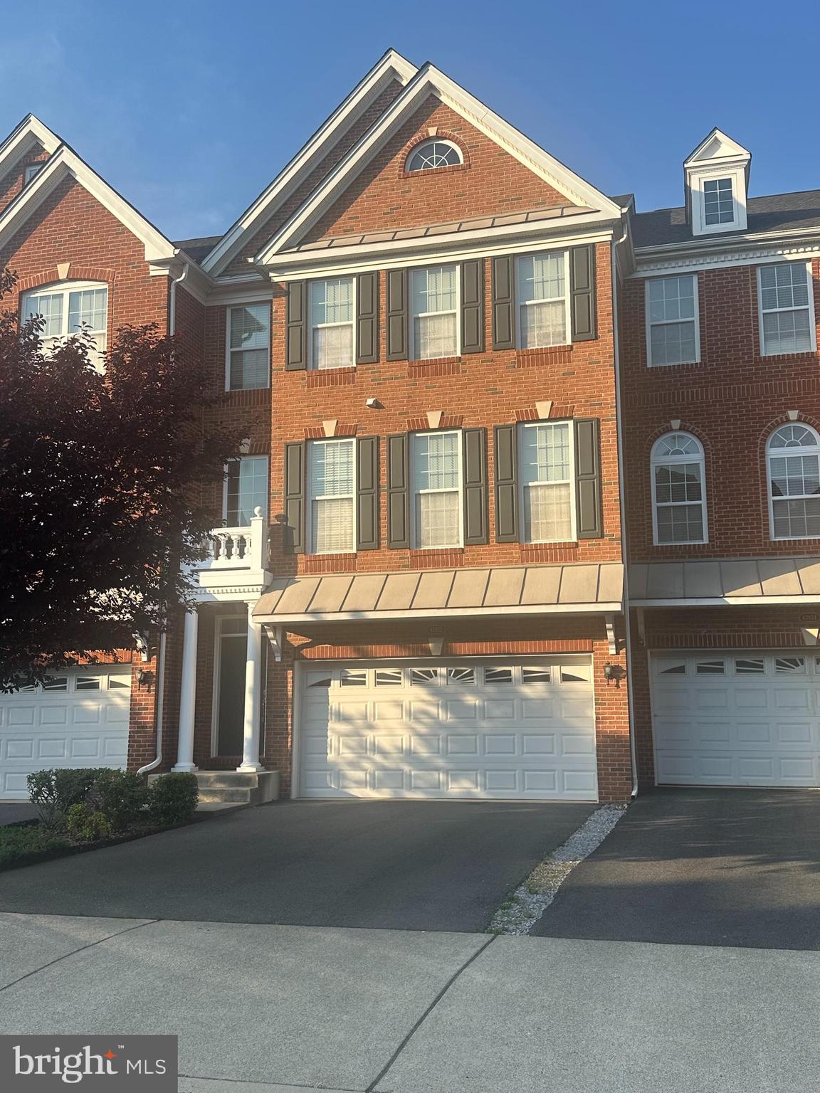 Welcome to this stunning brick-front townhome nestled in the highly sought-after Loudoun Valley Estates community, where timeless elegance meets modern comfort.Step inside to the main level and you’re immediately greeted by gleaming hardwood floors that flow seamlessly throughout, creating a warm and inviting atmosphere. The open layout leads you into a substantial gourmet kitchen, thoughtfully designed with granite countertops, a double sink, wall oven, built-in microwave, and an abundance of cabinetry—perfect for both everyday living and entertaining.The kitchen opens beautifully into a spacious family gathering area, allowing you to stay connected with guests while preparing meals—ideal for hosting and creating lasting memories.Continue outside to your brand-new, expansive Trex deck, offering the perfect setting for outdoor entertaining, summer barbecues, or simply relaxing in your private retreat.Upstairs, you’ll find three large and spacious bedrooms designed for comfort and relaxation. The luxurious primary suite serves as a true retreat, featuring a spa-like bathroom complete with a soaking tub, walk-in shower, double vanity, and elegant tile flooring. Two additional generously sized bedrooms share a well-appointed second full bath on this level, providing both convenience and functionality.The fully finished lower level expands your living space even further, offering an expansive family room with walk-out sliding doors—perfect for entertaining, a media space, or guest accommodations. This level also includes a third full bathroom, adding flexibility and convenience for visitors or extended living.You’ll also find access to the spacious two-car garage, featuring finished epoxy floors that create a clean, polished, and inviting entry every time you arrive home.With its elegant finishes, generous living spaces, and prime location, this home truly offers the best of comfort, style, and convenience.