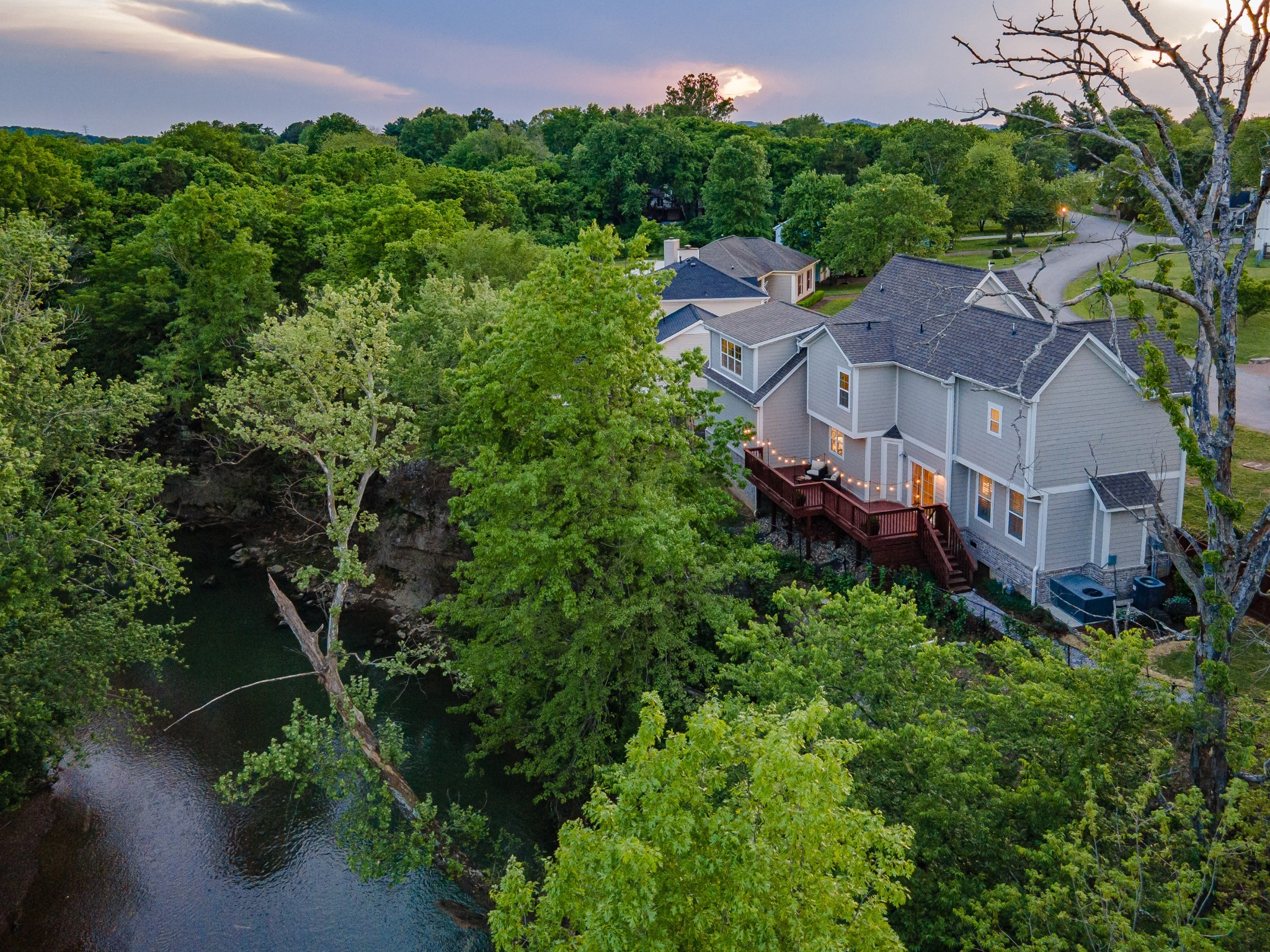*Assumable VA Loan at 2.25%!!* Who wants a unique Williamson County property that sits high on a bluff with beautiful views of the Harpeth River? You can walk a  trail down to the "fishing shelf" and fish from your own backyard! This 2018 build has a separate lot to the side lot that is privacy fenced and offers plenty of space that connects to the gorgeous back deck! You'll love the spacious floor plan layout, the beautiful hardwood floors and all of the natural light that this home has to offer! This property is in a great location just minutes from all of the restaurants and shopping that Franklin and Cool Springs has to offer! Call to schedule your showing today! * Sale includes 145 Rivergate Dr. *Back property line is in the Harpeth River so current lender requires flood insurance even though the house sits high up on a bluff above the river. Flood insurance policy only costs current owner $360 per year.* *Buyer to verify all info*