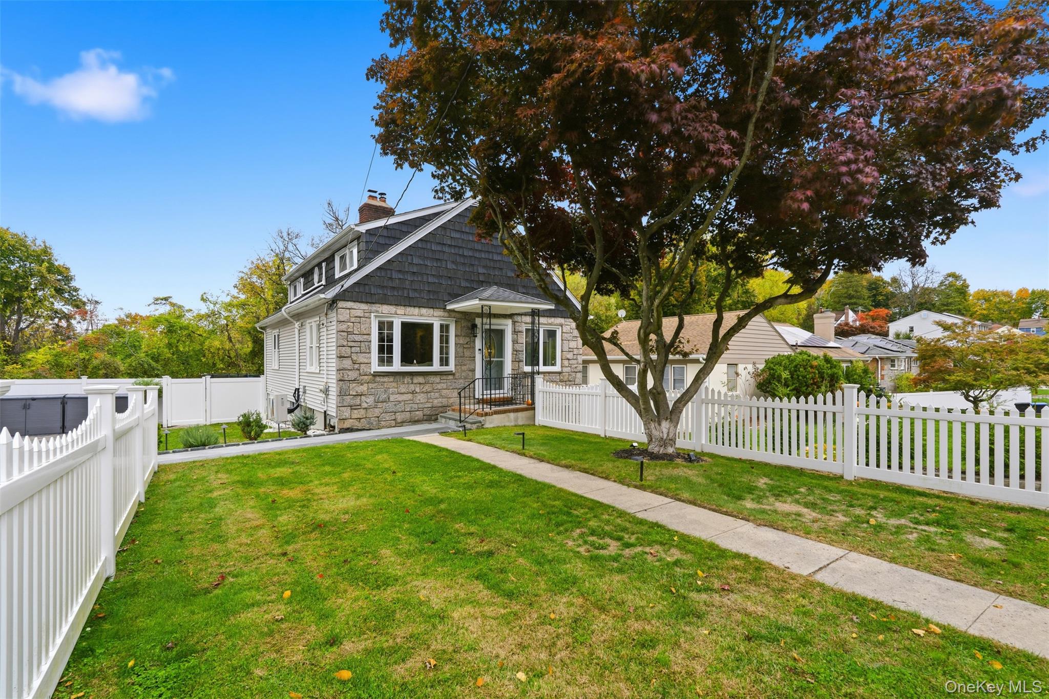 Move-in ready 4-bedroom, 2-bath residence set in the highly sought-after Poets Corner of Hartsdale. This beautifully maintained home offers a refined yet comfortable layout with sun-filled living spaces and generously sized bedrooms, ideal for both everyday living and entertaining. The private, flat, fully fenced backyard is a true retreat, featuring a patio ideal for al fresco dining, gatherings, or serene relaxation. Conveniently located near Metro-North, major highways, shopping, and dining, offering a seamless commute to NYC. A rare opportunity to own a turnkey home in one of Hartsdale’s most desirable neighborhoods.