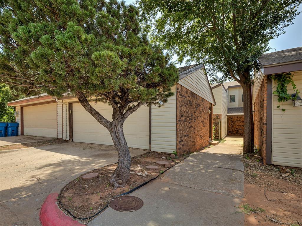 Unbeatable Price Point in the Heart of Edmond! Discover the perfect blend of comfort, convenience and community in this well-maintained 3 bed/2 bath/2 car townhome with a wood burning fireplace and golf course views. Woodcreek Townhomes are nestled near Kickingbird golf course, minutes from UCO, popular restaurants and highly-rated schools. Enjoy low maintenance living with lawn care included, plus access to neighborhood amenities like a clubhouse, pool, and basketball court - perfect for relaxing or entertaining! Inside you'll love the functional layout with the primary suite thoughtfully located downstairs, large living room with additional dining area, two bedrooms upstairs with one being another primary with a balcony. A two car garage is included as well. New HVAC, paint and updated bathrooms. Lastly, the front atrium serves as a striking focal point, bringing in soft natural light and adding architectural interest to the heart of the home. Whether you're a first-time buyer, downsizer, or investor, this home checks all the boxes in a desirable location of town.
