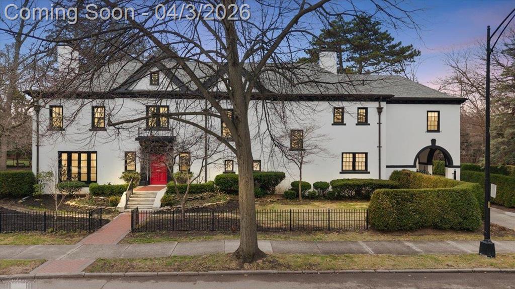 Stunning estate offering timeless character and modern updates, highlighted by 7 fireplaces and exceptional architectural detail throughout. The gourmet kitchen features high-end Thermador appliances, a large butcher block island, and opens seamlessly to a warm, inviting family room with fireplace- perfect for everyday living and entertaining. A grand foyer, elegant dining room with bay window, refined living spaces, and private library create a sophisticated yet comfortable main level. Upstairs, the spacious primary suite includes a fireplace, sunroom, and custom walk-in closet, with additional bedrooms and flexible living space across the upper levels. The finished basement showcases a unique speakeasy-style entertaining area, while recent updates add peace of mind: roof, stucco, paint, and driveway (2023). Step outside to your private retreat with a pond and in-ground salt water pool with automatic cover. 6 bedrooms, 4 full baths, 2 half baths. A truly exceptional home on a generously sized lot in the highly sought-after Grosse Pointe Farms location.