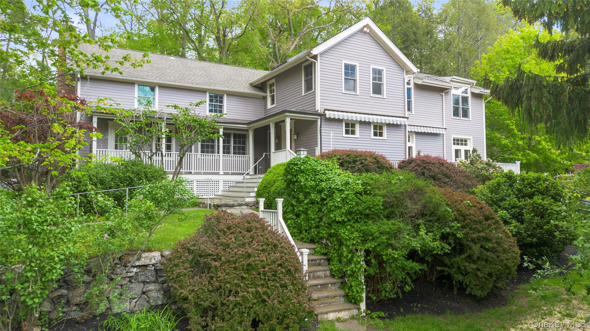 Style, Sophistication, and History in North Salem. A rare blend of timeless design and modern comfort, this Colonial Farmhouse in North Salem offers turn-key living in one of Westchester’s most scenic and desirable settings. Once the home of acclaimed actor Stanley Tucci, it was thoughtfully renovated by him to balance historic character with modern flair, making the residence as functional as it is beautiful. The first floor features a gracious entry hall that sets the tone for the rest of the home, leading to a modern chef’s kitchen with high-end appliances, seamlessly connected to an adjoining family room ideal for everyday living. A spacious dining area is perfect for hosting, while the sunken living room offers two distinct seating areas surrounding a large fireplace, creating the perfect atmosphere for intimate gatherings or larger celebrations. French doors open to an oversized porch, blending indoor and outdoor living with ease. The manicured grounds include a separate barn with a fully equipped studio, bedroom, and bath ideal for guests, a home office, or creative space. Surrounded by mature trees, lush gardens, and a heated pool with automatic cover, the property offers complete privacy and natural beauty. Just minutes from local shops, restaurants, and conveniences, yet set in a peaceful and private location, this home is perfect as a weekend escape or a year-round retreat where history, style, and comfort come together in perfect harmony.