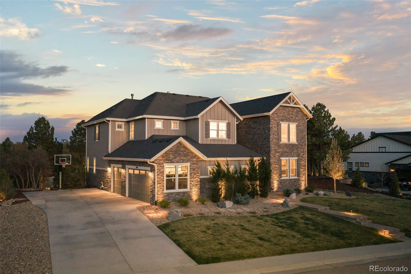 Welcome to an extraordinary estate in the prestigious Timbers at the Pinery, where luxury, craftsmanship, and privacy converge on one of the community’s most coveted lots backing to serene open space.Spanning over 8,000 square feet, this custom masterpiece showcases impeccable design and no expense spared in its extensive upgrades. From the moment you step inside, you’re greeted by soaring ceilings, expansive living spaces, and an abundance of natural light that perfectly frames the surrounding landscape.The heart of the home is a true chef’s kitchen, outfitted with top-of-the-line Wolf appliances, a Sub-Zero refrigerator, a built-in Miele coffee system, and a premium ice maker—seamlessly blending function with sophistication. Custom cabinetry, an oversized pantry, and thoughtfully designed storage elevate both everyday living and entertaining.Retreat to the luxurious primary suite, complemented by meticulously designed custom closets that rival high-end boutiques. Every detail throughout the home—from finishes to fixtures—has been carefully curated to deliver a refined and elevated lifestyle.Designed for both grand entertaining and comfortable living, the open-concept layout flows effortlessly to outdoor spaces that capture the beauty and tranquility of backing open space—offering privacy, views, and a true Colorado lifestyle experience.This is more than a home—it’s a statement of luxury living in one of the area’s most exclusive communities.Ask about our Preferred lender incentives towards rate buydown or closing costs