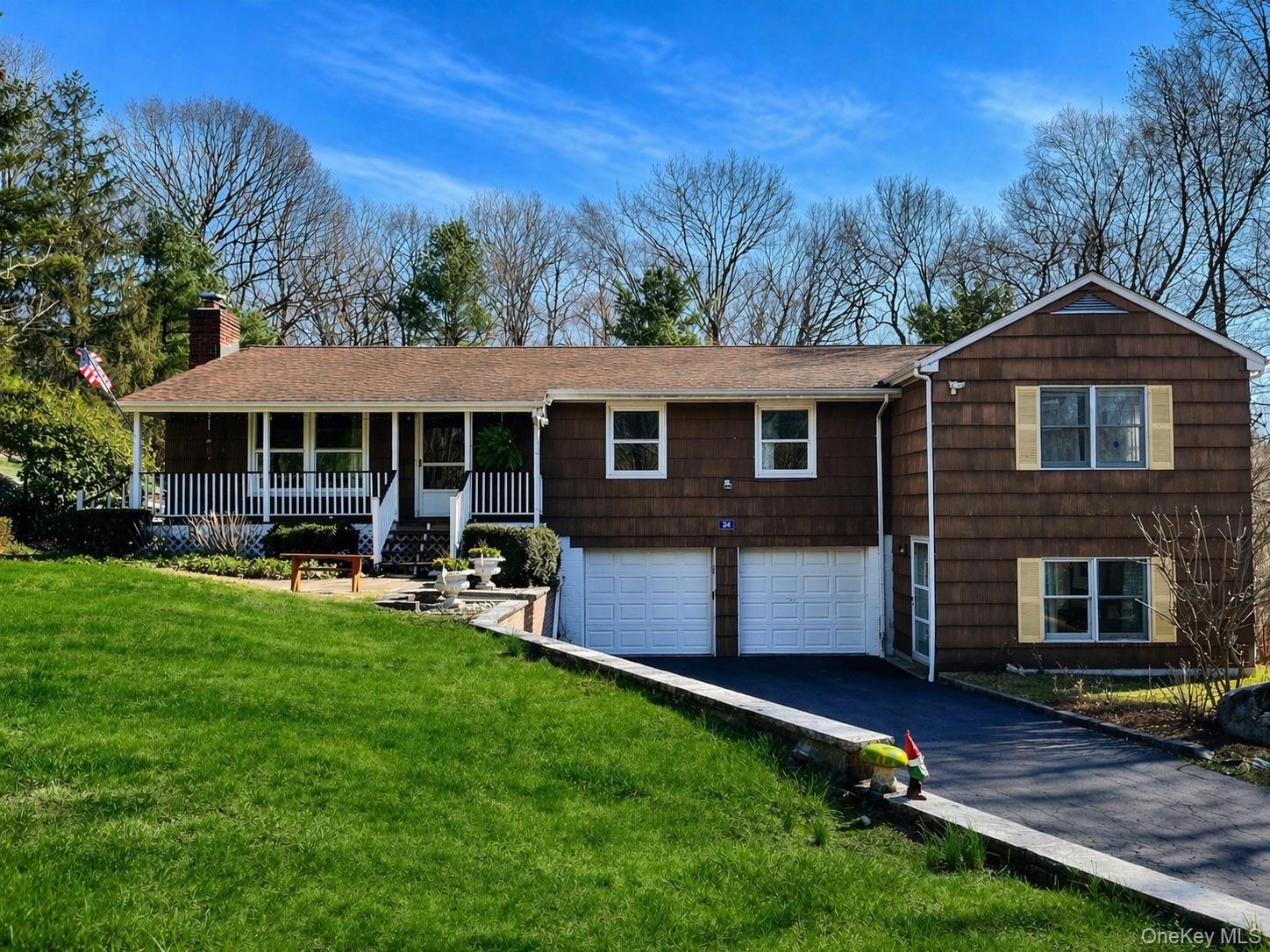 A Sprawling 2.68 Acre Haven with Majestic Rock Gardens!Discover this beautiful, private Ranch-style home nestled on 2.68 tranquil acres. This property offers a perfect blend of peaceful seclusion and versatile living spaces, all surrounded by stunning, mature landscaping. Exquisite Outdoor Sanctuary.The expansive, professionally landscaped grounds feature mature plantings, majestic rock gardens, stunning stone wall settings, a relaxing exterior patio, and a cozy fire pit area. Enjoy seamless indoor/outdoor living with a charming covered front porch and a screened porch—perfect for enjoying private views or escaping hot, buggy nights. The home offers peace of mind and has been nicely maintained with a thoughtful Interior Layout.Step inside this classic Ranch home to find a well-maintained layout showcasing sun-drenched rooms and hardwood floors throughout. The Living Room is anchored by a fireplace creating a warm ambiance. The Eat-in Kitchen features a large window with tranquil views of the backyard setting. Versatile Living.With a total of nine rooms, there is ample space for family gatherings and private retreats. The home offers 3 bedrooms plus a den, 2 full and 1 half bathrooms, including a Primary Suite with bath. The layout includes a spacious Family Room, which functions as an accessory apartment complete with French doors that open directly to the beautiful back yard. Additional space is found in the  walk-out lower level with windows, offering even more flexibility.This peaceful, private setting on 2.68 acres offers something unique in every season, and is conveniently located close to local restaurants, shopping, schools, and commuter trains.