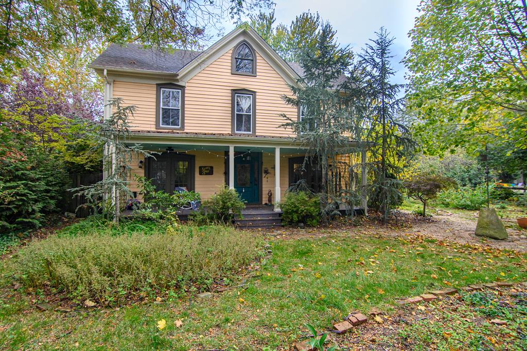 Welcome to the historic town of Onancock, where you will find this lovely gem. The home has been renovated to give modern touches but keep the integrity of the older Eastern Shore style. The property is landscaped in a park-like setting that will come alive in the spring, with a fenced-in yard, private patio, studio, carriage house that is architectonically cohesive with the main home. You are minutes from restaurants, boutiques, antique stores, galleries, only blocks away from Onancock's Town Wharf and just a five-minute drive to the local hospital. Great location for those who are not interested in being isolated yet desire privacy and convenience. As a bonus, the attic is totally finished and would be suitable for a study, or a bedroom. 3D Tour Available.