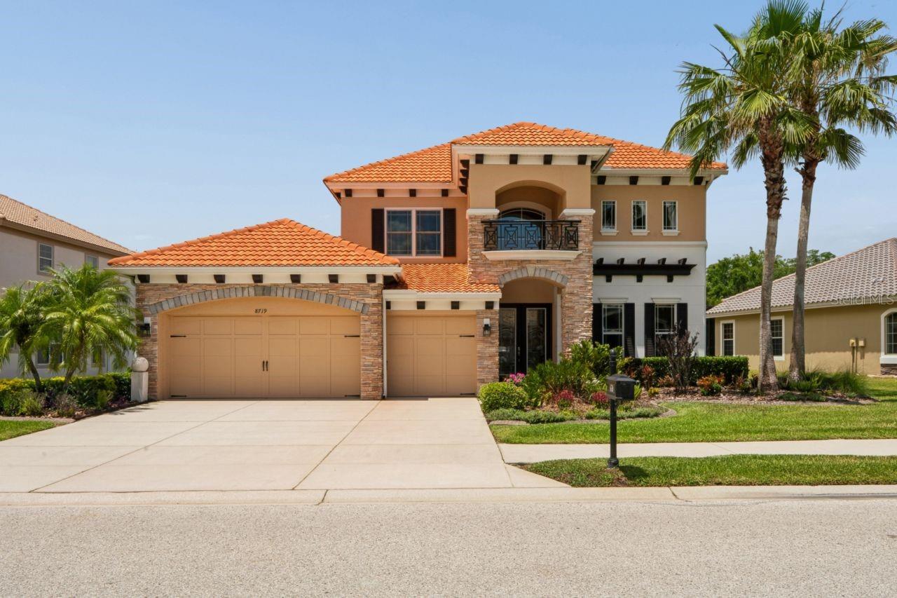 Welcome to your private Florida retreat in a historic neighborhood area known to be a popular vacation spot for the rich and famous, Hollywood elite, during the 1930s & 40s. The home is located on, one of a few, premium 0.50-acre lots overlooking a serene private/access lake view with exclusive, lakefront resident-only, boat access.  This beautiful home, built in 2009, offers over 3600 square feet. The spacious residence features 4 Bedrooms, 3 Full Baths, 2 Half Baths, including 2 spacious primary suites (one conveniently located on the main floor and another upstairs), making it ideal for multigenerational living or hosting guests. It also includes a main floor Office. The open-concept floor plan is filled with natural light and designed for both everyday comfort and entertaining. The chef’s kitchen features: Gas cooktop, Large center island, 42-inch cabinetry, Granite countertops, Two oversized pantries and top of the line stainless appliances, including washer and dryer. Professionally landscaped with reclaimed water irrigation, at home salt water pool-ready lifestyle along with access to a community clubhouse, fitness center, meeting/party room and 2 pools (adult and baby).    Recent upgrades: Upstairs HVAC (with transferable warranty) replaced (2026), Anderson windows (with transferable warranty) on entire top floor and lower primary bathroom (2024). Also, Fresh exterior paint (2023). Great location: Short distance to the grocery store and several restaurants. Downtown New Port Richey is a historic Rivertown community in north Tampa Bay with award-winning restaurants, shops, bars, and breweries. Its rich history is preserved by the Hacienda Hotel, Richey Suncoast Theatre, and the New Port Richey Museum. The nearby Pithlachascotee River offers boat docks, kayak launches, and a chance to see dolphins, manatees, and native Florida wildlife. While the James E. Grey Preserve offers an 80 Acre  Wildlife Sanctuary just minutes from downtown New Port Richey. There’s natural amenities like Sims Park and the Cotee River waiting to be explored. It’s not far to the famous Tarpon Springs Sponge docks and only 25 miles to Tampa International Airport. Enjoy everything that Tampa Bay has to offer from the new Downtown Riverwalk, top U.S. Beaches, boating, fishing, golfing, cultural entertainment, and museums. And of course year-round beautiful weather.