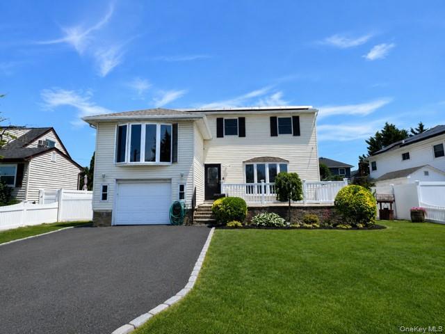 Move right into this beautifully renovated 4-bedroom, 3-full-bath home, offering exceptional space, modern finishes, and a flexible layout on a quiet street in the desirable Plainedge School District.Perfect!! The home features a versatile main-level layout with a separate entrance and potential for a mother/daughter setup with proper permits. Beautiful finishes throughout include solid oak flooring, porcelain tile, and a stunning updated kitchen featuring quartz countertops and stainless steel appliances. Additional upgrades include gas heating, gas cooking, brand-new ductless air conditioning, and OWNED solar panels.The full finished basement offers even more living space with a spacious recreation room—perfect for entertaining, a home office, gym, playroom, or additional storage.Outside, enjoy a large yard with plenty of space for gatherings, entertaining, and outdoor enjoyment. Conveniently located near shopping, parks, major parkways, transportation, and everyday necessities.A rare opportunity to own a completely renovated home offering modern upgrades, generous living space, and the flexibility to accommodate today’s lifestyle and extended-family needs.