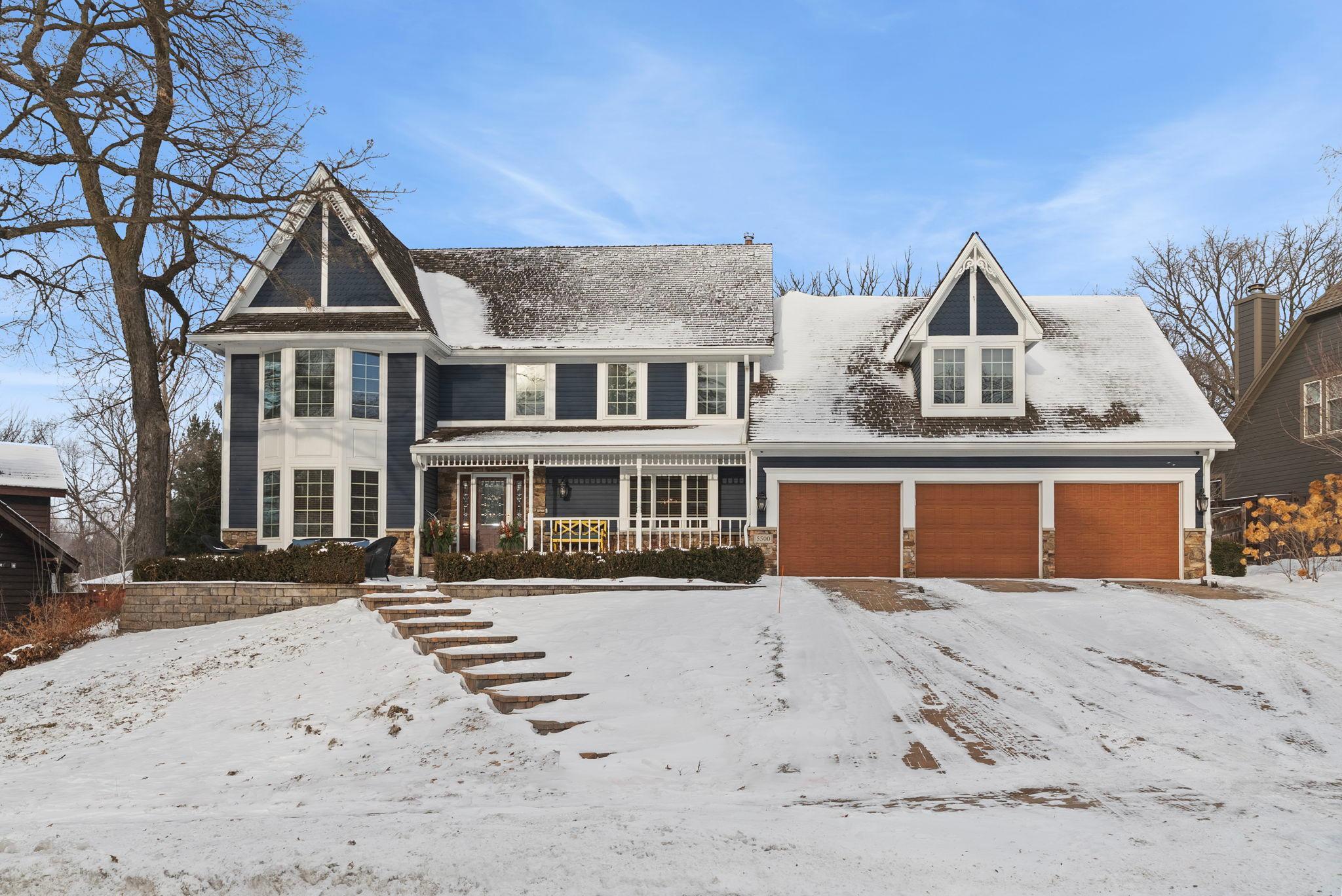 Resort lifestyle meets Bloomington! This exceptional 5-bedroom, 4+ bath home offers over 4,400 finished square feet of beautifully upgraded living space on a professionally landscaped 0.38-acre lot with a heated three-stall garage and a private, resort-style backyard retreat. Surrounded by mature trees and lush greenery, the in-ground sport pool creates a peaceful oasis with expansive concrete decking, sun deck patio, and automated system. Outdoor living continues with a composite deck with cable railing, princess balcony, expanded porch, and a large paver patio with fire pit—ideal for entertaining or quiet evenings under the trees. Architectural soffit lighting, landscape lighting, irrigation system, cedar privacy fence, and permanent programmable holiday lighting complete this stunning exterior.Inside, enjoy hardwood floors on the main level and stairs, LVP flooring in upper and lower-level living areas, solid oak six-panel doors, upgraded finishes, subzero fridge in the kitchen, and Hunter Douglas blinds throughout. Three gas fireplaces and heated flooring in the main family room add warmth and comfort. The finished lower level includes a wet bar, recreation and billiards area, home gym, and dedicated theater room.The primary suite is a true retreat with an upgraded spa-like bath featuring heated floors and custom California Closets. Smart home features include programmable interior lighting, whole-house LAN wiring, and a full security system. Major updates include newer windows, doors, siding, paint, gutters, garage doors, HVAC, multiple water heaters, and MyQ garage openers. A rare blend of luxury, privacy, and resort-style living—this home is truly one of a kind!