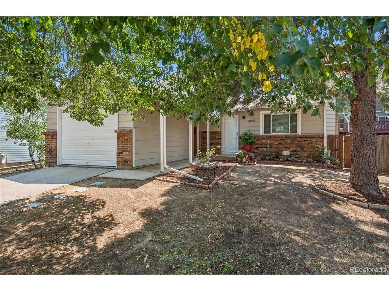 Welcome to this beautifully updated tri-level home featuring 3 bedrooms, 2 bathrooms, and a bright, open floor plan with soaring vaulted ceilings. The inviting living room includes a cozy wood-burning fireplace, creating the perfect space for relaxing or gathering with family and friends.The updated kitchen features quartz countertops, stainless steel appliances, and ample cabinet space, while new LVP flooring flows throughout the home. Extensive recent improvements include a new roof, furnace, air-conditioning system, dishwasher, water heater, and fence, along with updated bathrooms, fresh interior and exterior paint, double-pane windows, and ceiling fans. The warranties for the roof, furnace, and A/C are transferable to the buyer, providing additional peace of mind. A radon mitigation system has also been installed.Enjoy low-maintenance xeriscape landscaping in both the front and backyards, enhanced by two gorgeous mature trees. The fully fenced backyard offers a private outdoor retreat complete with a covered patio and built-in fire pit-perfect for relaxing, entertaining, and enjoying Colorado evenings.Located in the desirable Summer Valley community within the Cherry Creek School District, including Grandview High School, and offers convenient access to Cherry Creek State Park and Reservoir, Saddle Rock Golf Course, Southlands Mall, parks, restaurants, shopping, and major commuter routes.Whether you are a first-time homebuyer, looking to downsize, or searching for an investment opportunity, this home offers an ideal combination of comfort, style, and convenience. With its extensive updates, low-maintenance features, and desirable location, it is ready for you to move in and enjoy.Don't miss this exceptional opportunity to own a beautifully updated home in Summer Valley! Best of all, this home has no HOA. A nearby home at 5017 S. Quintero Circle, located just a few houses away, recently sold for $457,000.