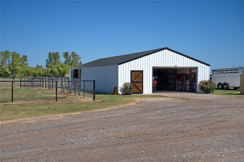 Located within the city limits of Norman, Oklahoma, this exceptional 23 ± acre horse property in Cleveland County offers the perfect blend of rural functionality and convenient access to town. Positioned near 60th Ave NW and Tecumseh, the property sits in the highly regarded Norman School District, ranked among the top school districts in the state. The land features over 73% Class I loam soils, providing an ideal foundation for equestrian use, grazing, and arena footing while supporting lush pasture growth.Designed with horse owners in mind, the property is extensively improved with 7 well-designed paddocks ranging up to 9.5 acres, each equipped with covered loafing sheds and Ritchie Industries automatic water troughs supplied by a water well with buried water lines running to all paddocks and pens. Additionally, 3 smaller pens (0.10–0.20 acres) provide excellent space for turnout, training, or isolation when needed. A solid panel round pen with a 25-foot radius offers a safe and functional training environment, while the property is secured by more than 9,000 feet of pipe and V-mesh wire fencing, providing durability and safety for horses and livestock.Equestrian facilities are anchored by a 200’ x 150’ outdoor riding arena and a 70’ x 30’ barn featuring four stables, offering ample space for training, riding, and daily horse care. Electric service is already on-site, and the property is accessed through an automatic pipe-gated entrance with 60 feet of clearance, making it convenient for trailers, equipment, and visitors. Whether you're operating a small equine facility, training operation, or private horse retreat, this well-appointed property provides the infrastructure, location, and land quality to support a wide range of equestrian pursuits.