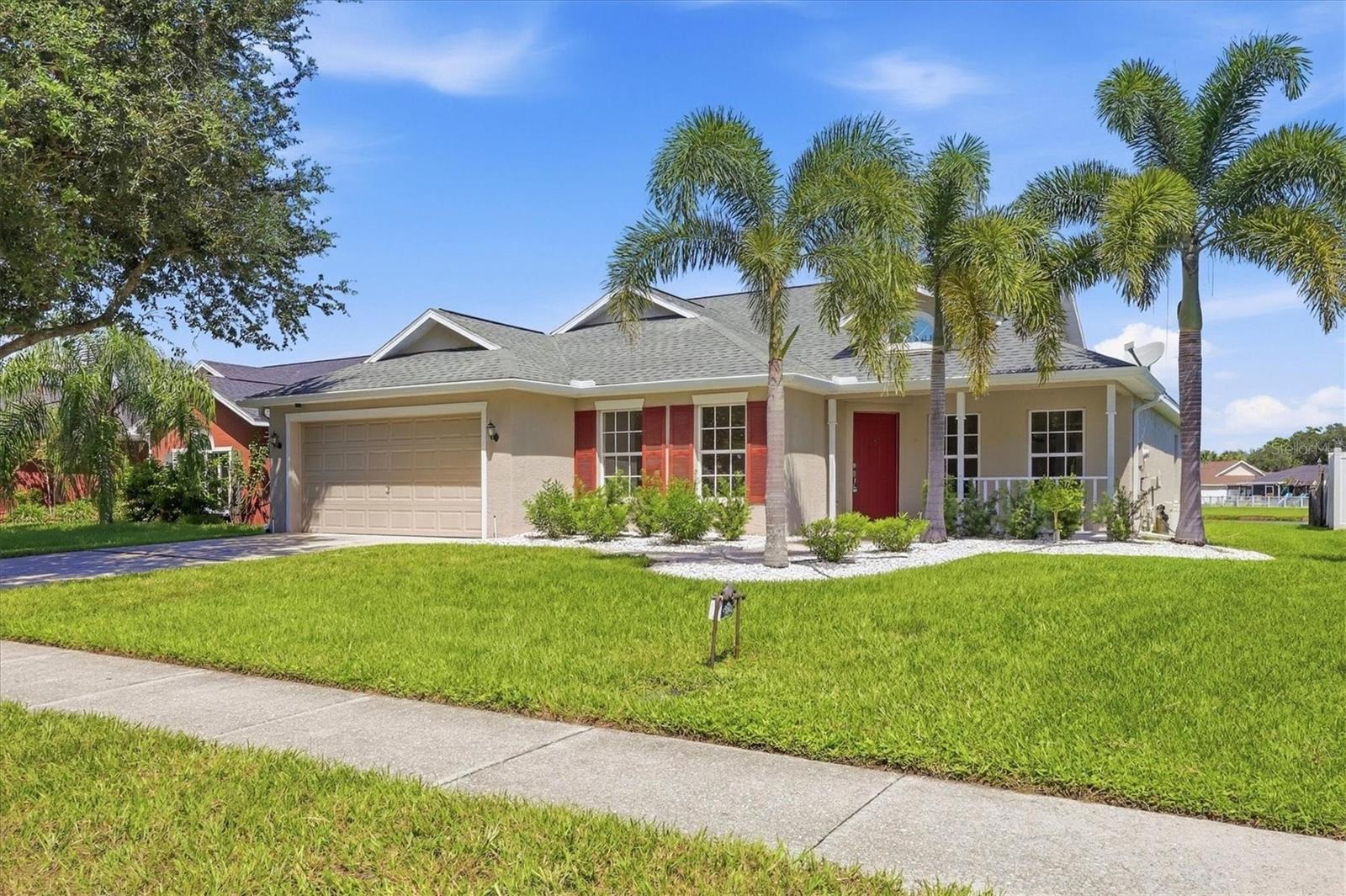 Welcome home to a fresh, upgraded and updated home where old Florida character meets today's Florida lifestyle.This beautifully refreshed 3-bedroom, 2-bath home with a den and additional carpeted flex room offers 2,845 square feet under roof, including 341 square feet of covered outdoor living space, in the established Kingsfield neighborhood.Step inside and you’ll immediately appreciate the open, bright and spacious floor plan, enhanced by cathedral ceilings, abundant windows and numerous new ceiling fans. The home has been thoughtfully updated and refreshed, making it ready for you to simply move in and enjoy.Beautiful Taj Mahal quartz countertops, new faucets and lighting throughout the kitchen & bathrooms create a clean and timeless look while maintaining the warmth of the home. The updated kitchen also features new stainless-steel appliance and a generous sized closet pantry providing ample storage and easy access to necessities. Throughout the living areas, new wood look large-format porcelain tile, fresh paint and new carpeting give the home a modern but warm, cohesive feel.The versatile floor plan provides plenty of room to live, work and entertain. In addition to the three bedrooms, the home includes a den and a carpeted flex room with a closet, providing options for creating a fourth or even fifth bedroom, a home office, hobby room, guest space, media room or whatever best fits your lifestyle. The spacious primary suite also features a generous walk-in closet.Step outside to the screened-in patio overlooking the lake and enjoy one of the special features of this property—the natural setting. Watch the abundance of resident birds and enjoy the peaceful surroundings that come with living in an established neighborhood filled with mature trees.Beyond the beautiful natural setting, residents also have access to a variety of community amenities designed for enjoying the Florida lifestyle. Take a refreshing dip in the community pool, spend time at the playground, shoot some hoops on the basketball courts, or take your four-legged friend to the dedicated dog area. These amenities add to the relaxed, neighborhood-oriented feel of Kingsfield and provide plenty of ways to get outside and enjoy the community - all with reasonable HOA fees and no CDD assessments often found in new developments. The best of both Floridas. Kingsfield has an established, Old Florida character that is increasingly hard to find. Mature oak trees and other large, established trees line the neighborhood, creating a sense of permanence, shade and character that you simply don’t get in many newer developments.Yet you’re also close to the growth and conveniences of Parrish and Lakewood Ranch, with their expanding selection of restaurants, shopping, entertainment, recreation and everyday amenities.For boaters and outdoor enthusiasts, Fort Hamer Park and its boat launch are nearby. And when you’re ready to explore farther, Tampa and Tampa International Airport are within easy reach, with the attractions of Tampa and St. Petersburg also accessible for day trips and entertainment.And, of course, some of Florida’s most beautiful beaches are nearby, including Anna Maria Island, Holmes Beach, Lido Key and Siesta Key.Welcome Home!Come home to a place that feels established, comfortable and welcoming, while putting the best of today’s Florida lifestyle right outside your door.