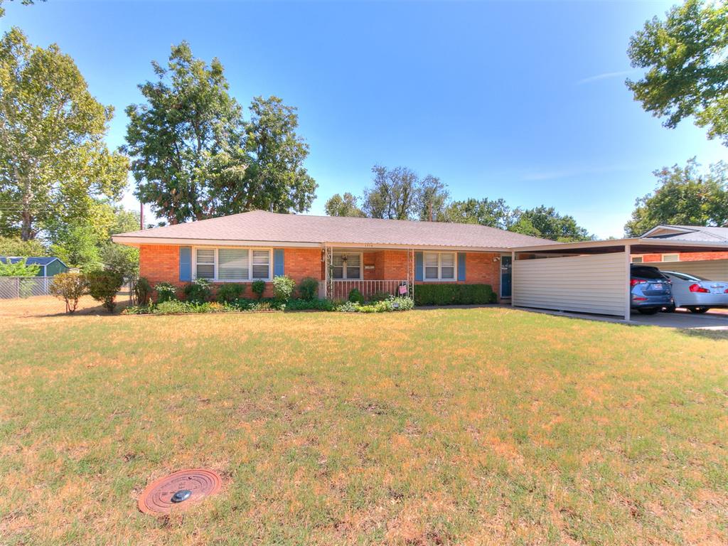 Welcome to 1716 Cruce Street, a spacious and inviting home tucked into an established central Norman neighborhood! Offering approximately 1,829 square feet with 4 bedrooms and 3 full bathrooms, this home provides a versatile floor plan with plenty of room to spread out. Mature trees, classic brick exterior and a covered front porch create a welcoming first impression before you ever step inside. The kitchen is a standout with an abundance of modern white cabinetry and counter space, tile backsplash, breakfast bar seating and an easy connection to the surrounding living areas. Whether you are preparing weeknight meals or hosting a crowd, there is no shortage of workspace or storage. All four bedrooms offer comfortable proportions, and three full bathrooms add convenience for everyday living. Throughout the home, you will find a combination of hard-surface flooring and carpet along with the character and charm you expect from an established Norman home. The thoughtful floor plan provides separation between spaces while still maintaining an easy flow throughout the home. Outside, the property continues to deliver! The fenced backyard offers plenty of room to enjoy the outdoors with mature landscaping and established trees providing a great backdrop. A covered outdoor area creates a comfortable spot for grilling, entertaining or relaxing outside, while the backyard storage building provides valuable additional space for lawn equipment, tools and seasonal items. Situated on approximately a quarter-acre lot, this home combines space, character and an incredibly convenient Norman location. You will be close to shopping, dining, schools, parks and everyday conveniences, with easy access to the University of Oklahoma and everything central Norman has to offer.
