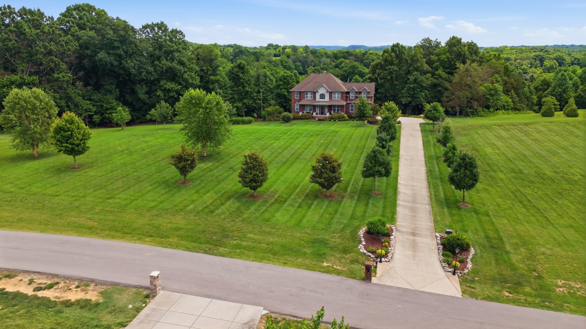 5 acre private estate at the end of a culdesac in a secluded neighborhood. You will feel the difference just driving down the private road coming to the home. You can feel the peace and serenity as you drive into the driveway seeing open land, beautiful fruit trees and this amazing all brick custom built home. This property is outdoor living at it's best with beautifully manicured landscaping, trees, garden and private pool. Imagine entertaining all your friends and family plus having a spacious beautiful home with a separate downstairs apartment. This home is a one of a kind property. This is a very good deal given all the features of this property. You will not find these type of amenities, privacy or serenity in the spec built homes in the cookie cutter subdivisions. You deserve for your home to be a sanctuary, a place for you and your family to escape to, have fun and rest. This is it!!