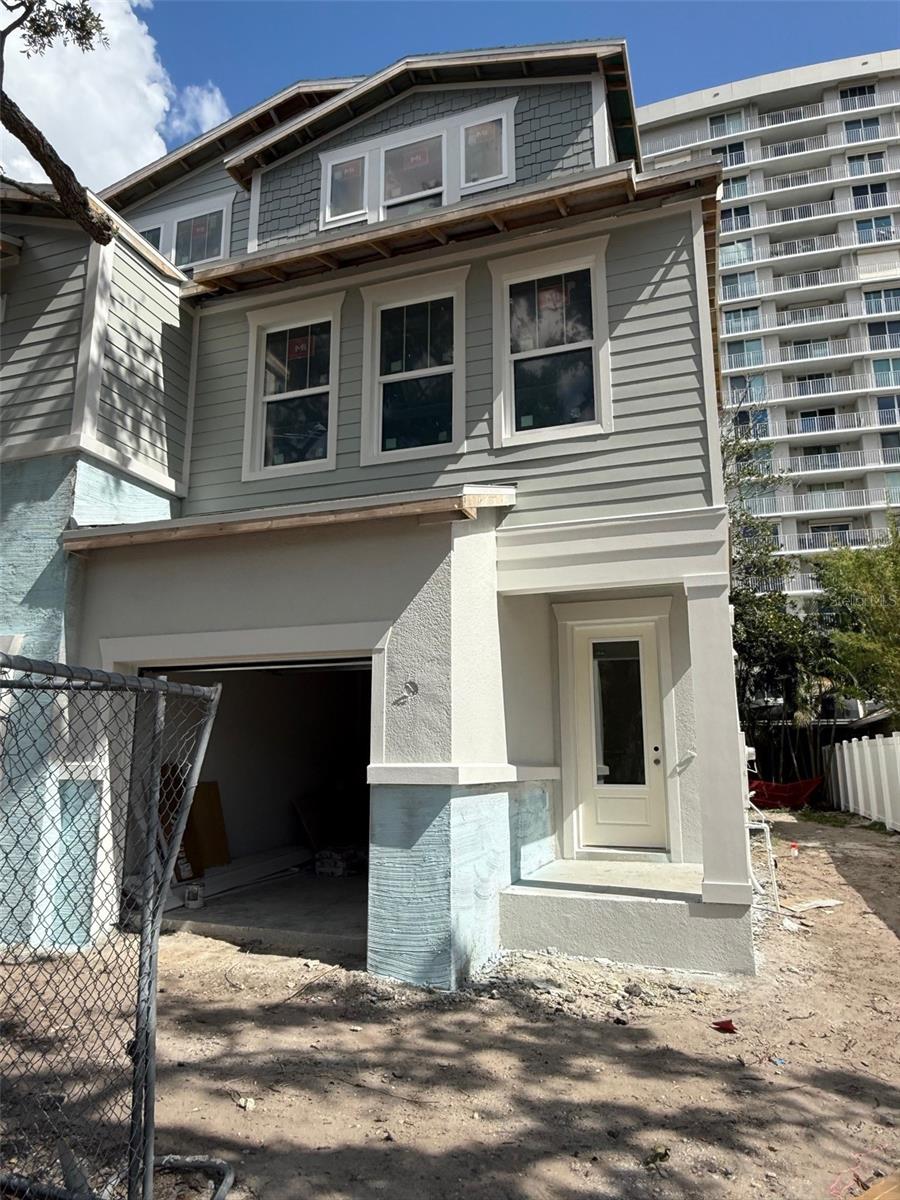 Under Construction. Exceptional 3-Story Townhome in SOHO with a prime location near Bayshore Blvd! This townhome offers both luxury and convenience, just 1 block away from the famous Bayshore Blvd. Known for having the longest continuous sidewalk, Bayshore is ideal for morning jogs, bike rides, or dolphin watching along the water. With vibrant downtown Tampa less than 2 miles away, you’ll have easy access to dining, outdoor activities, and sporting events, making it the perfect home for those who want to be at the center of it all.
Boasting incredible curb appeal, the exterior features a blend of Hardie plank siding, stucco, and stone detailing. This fee-simple townhome offers more flexibility, with no HOA fees, giving you the freedom to make this home truly your own. The fenced-in backyard offers additional privacy and outdoor space for relaxation or entertainment.
Inside, the design team has created an elegant and functional layout, blending rich maple and cream hues with black hardware. The standout kitchen is a dream with a white farm sink, decorative backsplash, and sleek quartz countertops. The open floor plan is perfect for family gatherings, creating a seamless flow throughout the main living areas.
The second floor features an oversized primary suite with three large windows, filling the room with natural light. This suite also boasts a walk-in closet and a convenient door leading directly to the laundry room. On the opposite side of the second floor, an additional en-suite provides privacy and comfort for guests or family members. Throughout the home, oversized windows allow natural light to flood the stairwells and main living areas, complemented by elegant rev-wood laminate flooring.
The third floor is designed with versatility in mind, offering two separate bedrooms, a bonus room, and a full bath. Whether you're looking for a home office, playroom, or additional guest space, this floor provides the flexibility to meet your needs.
This townhome comes with a list of high-end extras, epoxy garage floor and gutters for added convenience. A refrigerator is also included, making it move-in ready.
Located within the highly sought-after Mitchell, Wilson, and Plant school districts, this home provides peace of mind for families. Additionally, it is backed by a comprehensive builder’s warranty from David Weekley Homes, ensuring a smart, worry-free investment.