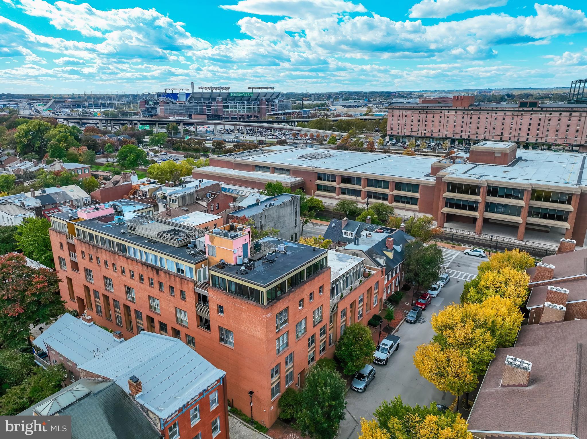 Perched above historic Otterbein, this 2‑bed, 2‑bath penthouse blends city convenience with quiet, cobblestone‑street charm. Step inside to a light‑filled layout with granite countertops throughout, stainless steel appliances, and an in‑unit washer/dryer. Both bedrooms frame sweeping city views, while the primary suite features built‑ins and a large walk‑in closet. Bathrooms include a recently updated shower with timeless finishes.Your private outdoor retreat awaits: a spacious balcony—perfect for morning coffee or sunset toasts—plus an additional community rooftop terrace, all showcasing picture‑perfect views of Downtown Baltimore. The secure, well‑managed building offers 24/7 key‑fob access, a dedicated storage unit, and covered assigned parking plus visitor parking (2 spaces).Live moments from M&T Bank Stadium, Oriole Park at Camden Yards, the Inner Harbor, and Federal Hill—along with some of the city’s best restaurants, parks, and pocket gardens. Commuters will love quick access to I‑95/295, the MARC Train, and Light Rail.This is city living done right— skyline views and an A+ location in a sought‑after neighborhood. FHA approved community (buyer to verify). Schedule your tour of PH‑3 today.