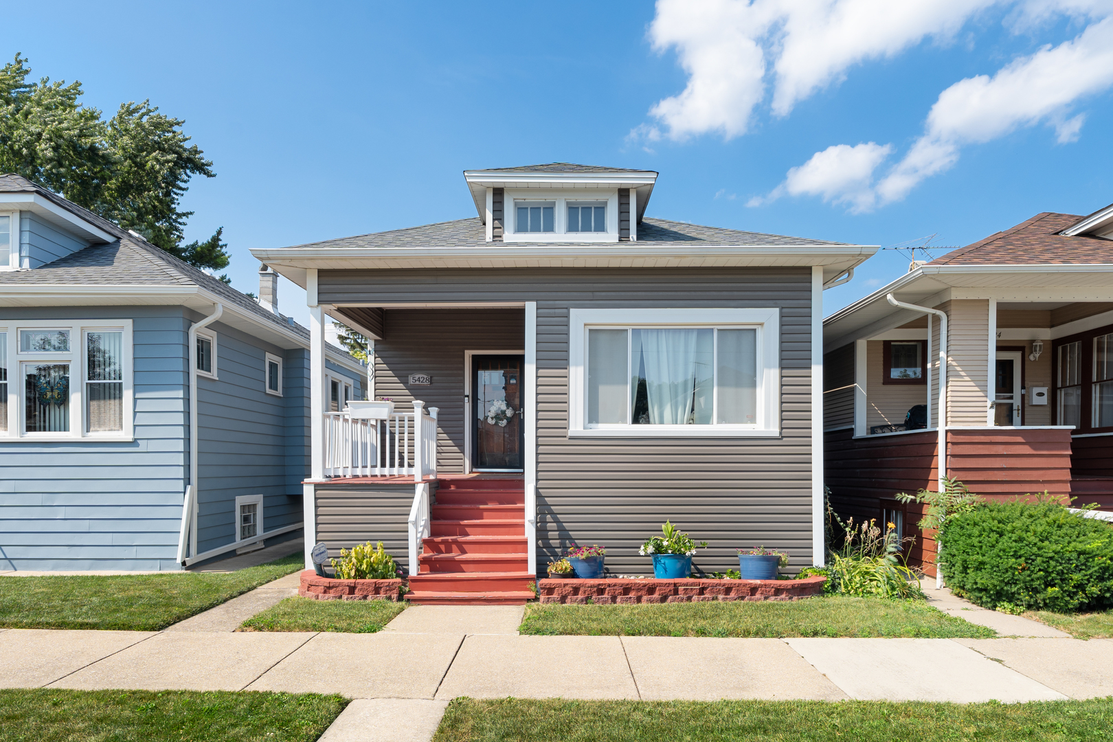 Beautifully updated home in a highly desirable neighborhood! This charming 4-bedroom, 1.5-bath residence offers the perfect blend of modern updates and timeless character. Featuring 3 spacious bedrooms on the main level and an additional bedroom in the finished basement, this home provides flexible living options for families, guests, or a home office. The kitchen, fully renovated in 2019, boasts elegant white cabinetry, marble countertops, and stainless steel appliances. Major updates include a brand-new electrical system and panel (2023), newer furnace and central air (2017), roof (8 years old), and updated windows (8 years old).    The finished basement offers extra living space, a half bath, and endless possibilities for a recreation room, gym, or media space. Outside, enjoy a private backyard and a 2-car garage for convenience.    Located in a sought-after area with highly rated schools, beautiful parks, and vibrant community amenities, you'll be just minutes away from shopping, dining, public transportation, and major highways. Whether you're raising a family, looking for a move-in ready home, or wanting a friendly neighborhood with plenty to do, this property has it all. Schedule your private showing today and make this beautiful house your new home!