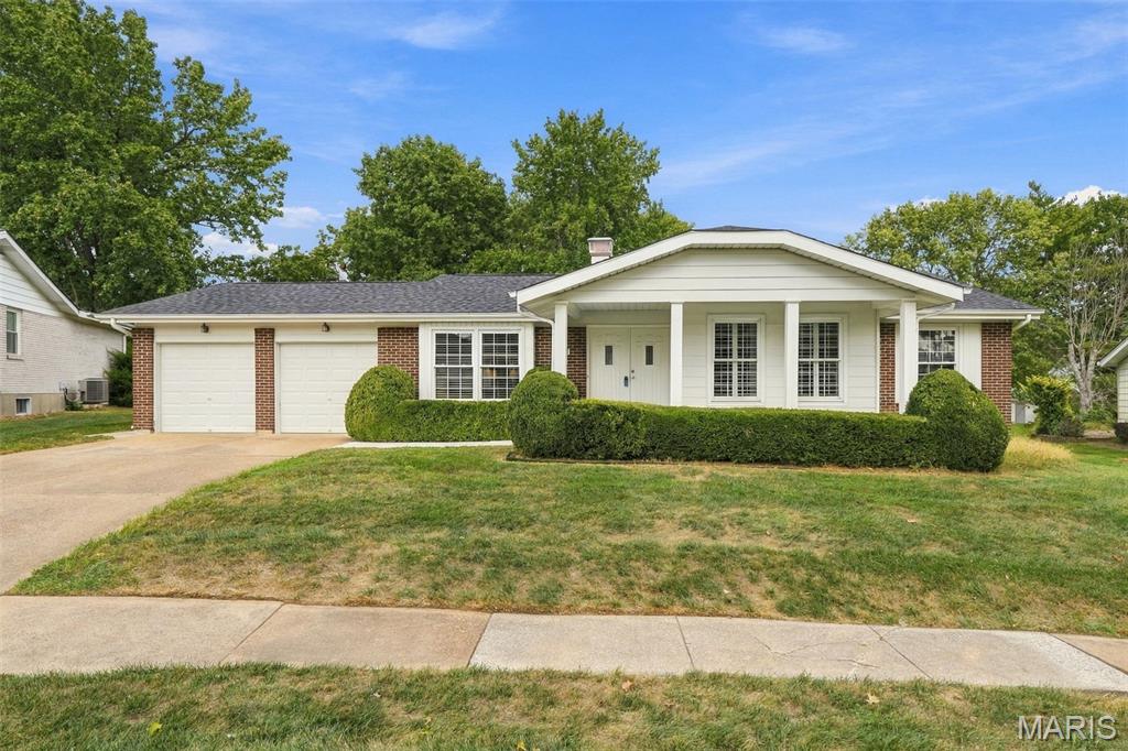 The owners outdid themselves updating this home. From installing solid Hickory Wood flooring & new carpeting, to removing popcorn ceilings, putting in taller baseboards & 6 panel doors, opening up walls to let the light shine through & more, you'll be impressed. The sunlit living room is perfect for your book club meetings, while the family room is prompting you to start thinking about cool evenings in front of the gas fireplace with a warm beverage & a cozy book. The Kitchen is an absolute delight with floor to ceiling cabinets, Quartz countertops, gas stove, gorgeous island & pantry. You'll love how it's open to both the dining & family rooms. Newer roof with gutter guards so you can cross cleaning gutters off your list! From the dining room, step out from the French doors to the large stamped patio & back yard. Master bedroom has ensuite bath (shower) & walk in closet. 2 other bedrooms upd with windows, light fixtures, carpeting & doors. Upd hall bath is a dream with its soaker tub. Lower level recently had additional lighting put in along with extra electrical outlets. Newer Electrical panel, hot water heater & much more! Oversized Garage