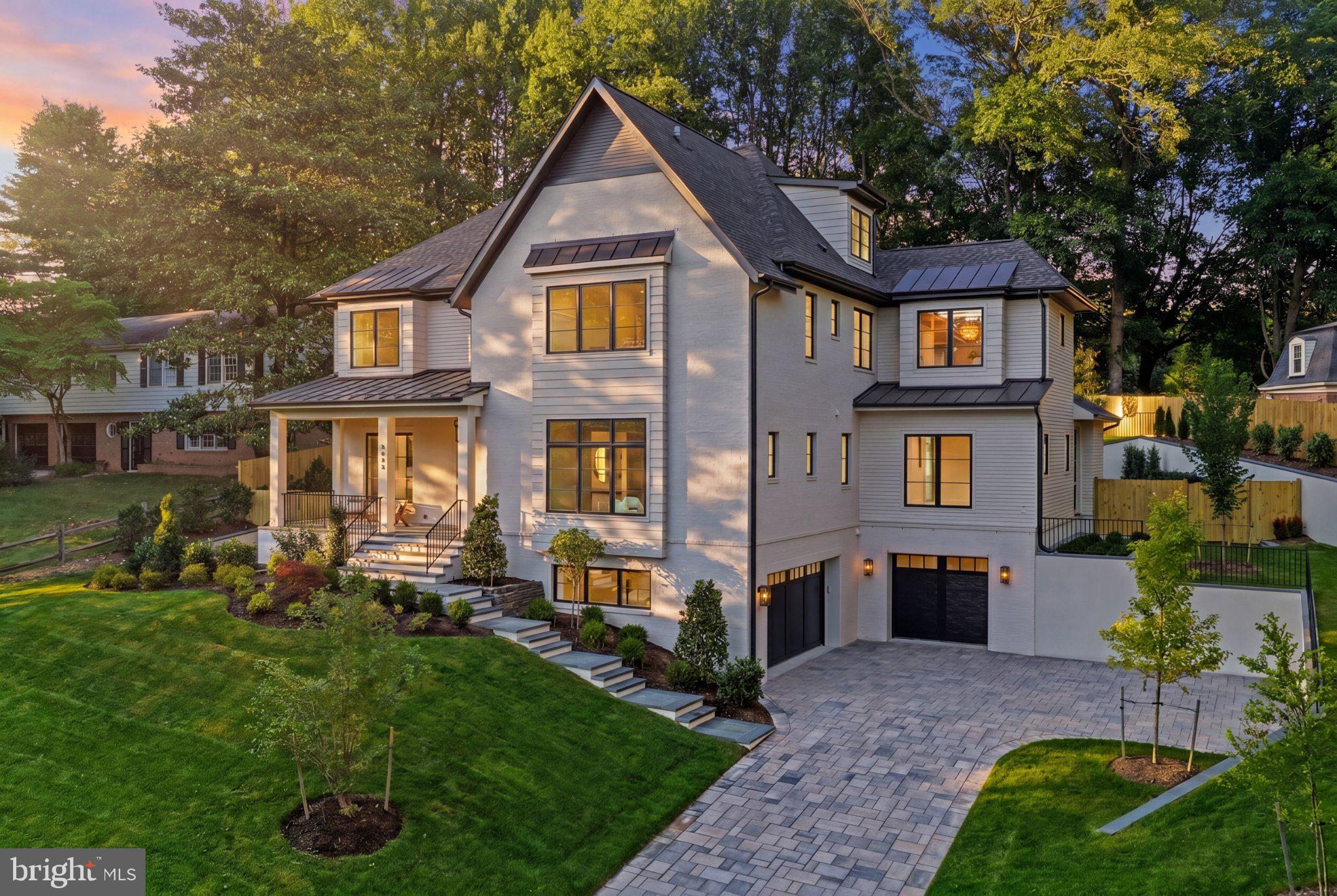 Whitestone Custom Homes, one of Northern Virginia's most celebrated builder of traditional luxury residences, is proud to introduce their next signature masterpiece at 5840 Hilldon Street. Set on a commanding, elevated half-acre lot in one of McLean's most sought-after neighborhoods, this 7,700+ square foot estate will announce itself with the unmistakable Whitestone street presence — a timeless traditional façade dressed in Hardi-Plank fiber cement, Hardi-Shake siding, and painted brick. CertainTeed 30-year architectural shingles, and a sweeping front porch crowned with a Bevolo gas lantern. Stone-paver driveway,  Flagstone walkways and porch surfaces and stucco parged retaining walls with Flagstone caps, premium landscaping, underground irrigation, and a full outdoor lighting package complete the arrival experience.Inside, a grand foyer sets the tone immediately. Ten-foot ceilings, rich hardwood floors, elegant stonework, and custom millwork establish an atmosphere of warm, understated refinement throughout the main level. Formal spaces include a dedicated dining room and a library with custom built-ins. The gourmet kitchen is appointed with chef-grade appliances, bespoke cabinetry, quartz countertops, and a generous center island, opening to a sun-filled breakfast room and a coffered-ceiling family room anchored by a gas fireplace. A screened-in porch with a stone fireplace extends the living space outdoors to lush, private grounds with room for an optional pool. A flexible main-level study doubles as a full bedroom suite.The upper level is anchored by a luminous primary retreat featuring expansive walk-in closets and a spa-caliber bath with heated floors. Four additional en-suite bedrooms complete the level, while a private fourth-floor loft suite — with its own lounge, sleeping area, and full bath — offers a secluded sanctuary within the home. The lower level delivers exceptional recreational versatility: a large recreation room, dedicated gym, game room, wet bar, media or golf simulator room, bedroom and bath, generous storage, and an optional wine room.Structural and energy-efficient features are equally impressive: 2x6 framing for superior rigidity, enhanced insulation throughout, Marvin premium windows, multi-zone high-efficiency HVAC, and comprehensive sound insulation. The four-car garage (two tandem spaces) includes ultra-quiet door openers and an EV charging outlet. An optional elevator provides future-forward convenience.Perfectly situated in Chesterbrook Woods, residents enjoy seamless access to Washington D.C., Tysons Corner, Metro, two international airports, parks, pool clubs, bike trails, and top-rated Fairfax County schools. Contact us today to meet with the builder, tour a completed Whitestone home