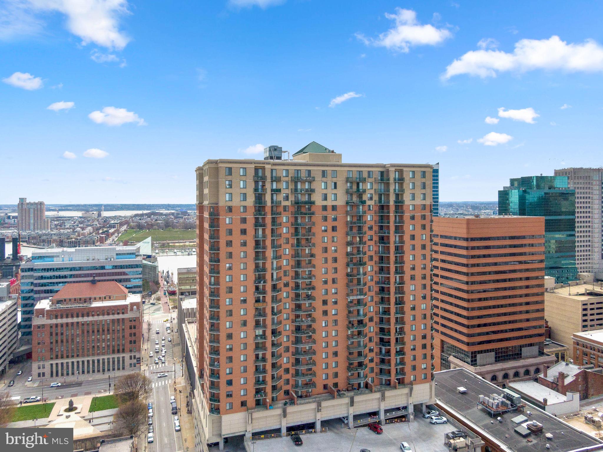 Welcome to 414 Water Street, Unit 1603, a beautifully appointed residence in one of Baltimore's premier Inner Harbor condominium communities. This stunning 2-bedroom, 2-bathroom home offers an open and inviting floor plan highlighted by rich hardwood floors, granite countertops, a breakfast bar, stainless steel appliances, and the convenience of an in-unit washer and dryer. Step outside to your private balcony and enjoy beautiful water views while taking in the vibrant city skyline. Residents enjoy an exceptional array of amenities, including an outdoor swimming pool, fully equipped fitness center, business center, conference room, and the added benefit of parking included in the condo fee. Ideally located in the heart of downtown Baltimore, this home provides easy access to major commuter routes including I-95 and is just moments from the Inner Harbor, waterfront attractions, restaurants, entertainment venues, and many of Baltimore's historic neighborhoods. Experience the perfect blend of luxury, convenience, and urban living at 414 Water Street, Unit 1603.