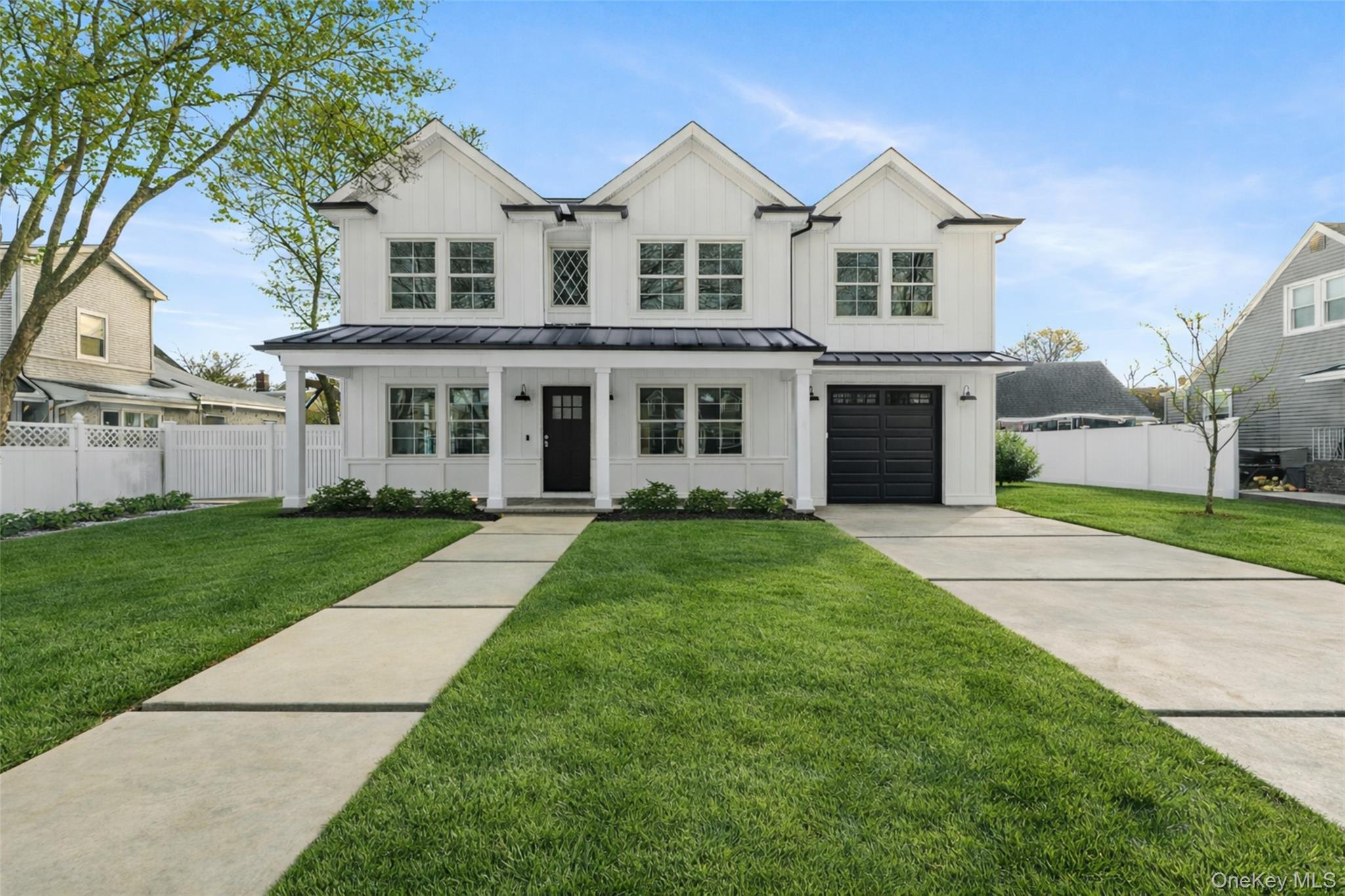 Welcome to 254 Elizabeth Avenue, Oceanside – Almost 100% Completed!Set on an oversized 80 x 100 property, this stunning new home offers the ultimate open layout designed for today’s lifestyle. The main level features a formal living room, spacious dining area, and a custom eat-in kitchen with a walk-in pantry, 12' island, undermount microwave and Thermador 6 burner gas range . A versatile den, plus a first-floor bedroom and full bath, provide flexible living options for guests, extended family or in home office.Upstairs, you’ll find four generously sized bedrooms, including a luxurious primary suite with a private bath, double vanity and impressive, completely outfitted walk in closet. Three additional bedrooms share a full bathroom with 2 vanities, creating the perfect layout. Additional highlights include a one-car attached garage, partial basement for storage, and a prime residential location.This is your chance to own a brand-new home in one of Oceanside’s most desirable neighborhoods! 2 Zone central air, gas heating system, top of the line everything!