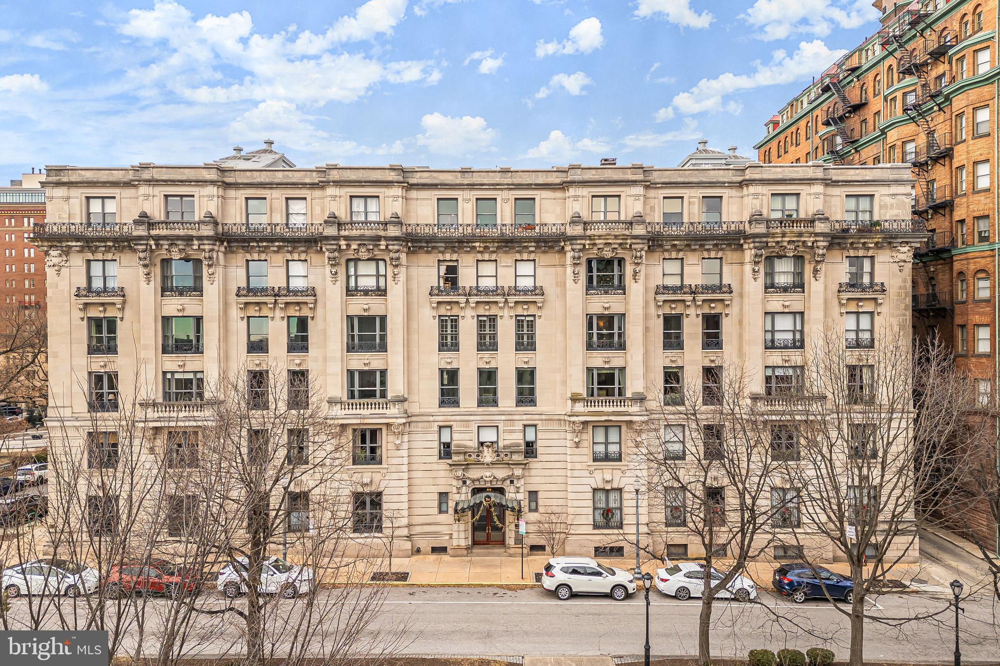 NEW PRICE — A RARE OPPORTUNITY IN ONE OF MIDTOWN MOUNT VERNON’S MOST DISTINCTIVE RESIDENCES!  Luxury 3BR, 2BA co-op in a prime Midtown Mount Vernon location with sweeping views of the Washington Monument! Fully renovated in 2020, this move-in-ready residence features soaring ceilings, floor-to-ceiling windows, gleaming inlaid hardwood floors, original architectural details, designer finishes, and an open-concept layout filled with natural light. Gourmet kitchen, spacious bedrooms, 1 separately deeded parking space is available, and 24-hour concierge service. Enjoy a walkable location just steps from restaurants, cafés, museums, Penn Station, downtown, and major commuter routes. *ALL TAXES, WATER, HEAT, DAILY TRASH/RECYCLING SERVICE, AND 24-HOUR DOOR ATTENDANTS ARE INCLUDED IN THE COOP FEE!