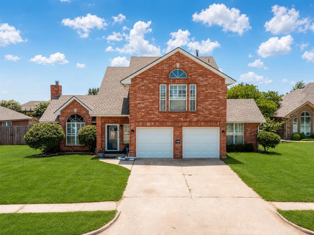 Welcome to one of West Norman's most desirable neighborhoods. Situated in a highly sought-after school district with Roosevelt Elementary just across the street, this impressive 4-bed, 2.5-bath home offers over 2,000 square feet of beautifully designed living space that's perfect for growing families. From the moment you arrive, you'll be captivated by the home's grand presence. Step inside to a stunning living room featuring cathedral ceilings accented with wood beams, an impressive fireplace that serves as the room's centerpiece, elegant built-in bookshelves, & an abundance of windows for natural light. The kitchen is thoughtfully designed with a convenient breakfast bar that opens to the living room, updated appliances including double ovens, center island, generous counter space, painted white cabinet. The downstairs bedroom is generously sized with tall ceilings & is conveniently located next to a bathroom, making it ideal for guests, a home office, or multi-generational living. The primary suite is a true retreat, offering soaring ceilings, & an incredible three closets. The luxurious en-suite spa, features double vanities, a soaking tub, & a walk-in shower. The upstairs of the home has been updated with new carpet & the entire home has been recently painted. 2 additional bedrooms provide generous space & closets. Enjoy the covered back patio overlooking an expansive backyard. The first section offers a large lawn perfect for entertaining & play, while the rear of the property is shaded by mature trees. A storage shed provides additional space for equipment. The recently installed storm shelter offers added peace of mind. Residents of Castlerock enjoy neighborhood amenities, a community pool & jacuzzi, walking trails, basketball court, & a large stocked fishing pond. Conveniently located near lots of amenities & with easy freeway access.  This is an exceptional opportunity to own a beautiful home in one of Norman's most sought-after neighborhoods.