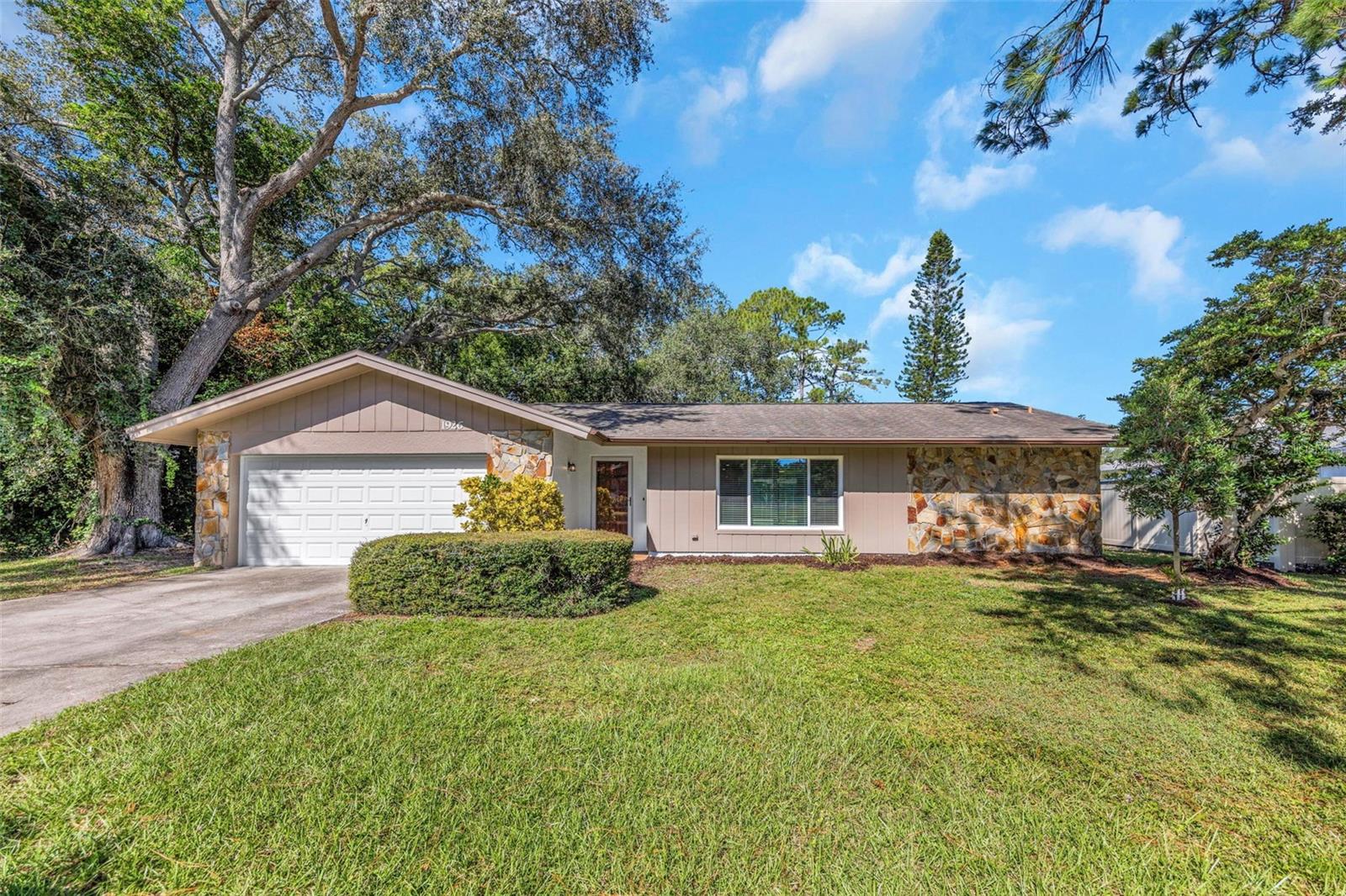 * * DO NOT MISS OUT ON RARE OPPORTUNITY TO OWN IN BRAE MOOR JUST MINUTES FROM DOWNTOWN DUNEDIN * * Beautifully updated home located on a .43 acre lot that backs up to a wooded area.  LOTS OF PRIVACY AND PLENTY OF ROOM TO PLAY!  Over the last few years, home has had roof installed (2019) - $28,000 worth of hurricane windows/sliders (2023) and full cosmetic update on the inside.  Home has just been freshly painted inside and out is ready to move in!  GREAT OPEN FLOOR PLAN! Kitchen was completely updated and modified to overlook the HUGE living and dining space.  Kitchen also overlooks an oversized family room.  Sliders from the family room, dining room and master bedroom got out to lengthy covered patio that overlooks screened pool!  Master bedroom has plenty of room.  Master bathroom has walk-in shower,  dual sink vanity AND a separate make up sitting area. Inside utility room.  Split bedroom plan * * * Subdivision is 5 minutes from DUNEDIN CAUSEWAY which gives you access to beautiful Honeymoon Island/Beaches and Caladesi Island. Both voted the #1 Beach in America over the last few years. Subdivision is minutes from the Pinellas Trail.  Just 10 minutes further south and you can enjoy the Small and Quaint community of Historic Dunedin. Perfect location to enjoy all the amenities that Dunedin has to offer. Downtown Dunedin offers wonderful restaurants, marina, central park with stage for concerts and movies and much more! Just a few blocks away is DUNEDIN HIGHLANDER PARK – This is Dunedin’s flagship park that is home to Dunedin Fine Arts Center, swimming center, water park, tennis courts, baseball fields, volleyball courts, playgrounds and playing fields. LIKE BASEBALL? Dunedin is the home of Toronto Blue Jays spring training and triple AAA baseball facilities. Clearwater homes the Philadelphia Phillies and just 45 minutes away is the New York Yankees facilities. * * PLEASE NOTE * * It is buyer’s responsibility to verify all information. Information posted in MLS, or any marketing information is not guaranteed.