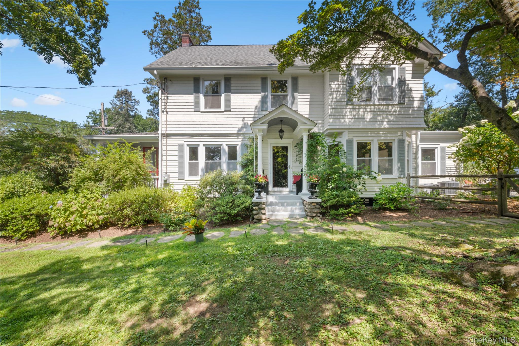 Nestled in a tranquil cul-de-sac, this captivating single-family home effortlessly combines historical charm with modern amenities. Set on a third of an acre with lush, mature landscaping for beauty and privacy, the property also features a fenced yard—an ideal space for pets, play, or outdoor relaxation. The antique home, distinguished by its high ceilings and vintage architectural details, welcomes you with a classic front porch, inviting you to appreciate its timeless appeal.

Inside, the residence features an elegant entrance foyer that leads to a spacious, light-filled formal dining room, perfect for entertaining. The chef’s kitchen is a culinary enthusiast's dream, equipped with granite countertops, a sizable kitchen island, and ample pantry space for all your storage needs. Two and a half well-appointed bathrooms serve the home, offering convenience for family and guests alike.

The home boasts four generously sized bedrooms, including a luxurious primary bathroom that provides a serene retreat. Each room reflects the property’s history while accommodating a modern lifestyle. Ample storage throughout ensures functionality without compromising on the aesthetic integrity of this antique gem.

This property offers a unique opportunity to own a piece of history complemented by today’s comforts, making it an ideal sanctuary for those seeking both elegance and practicality.