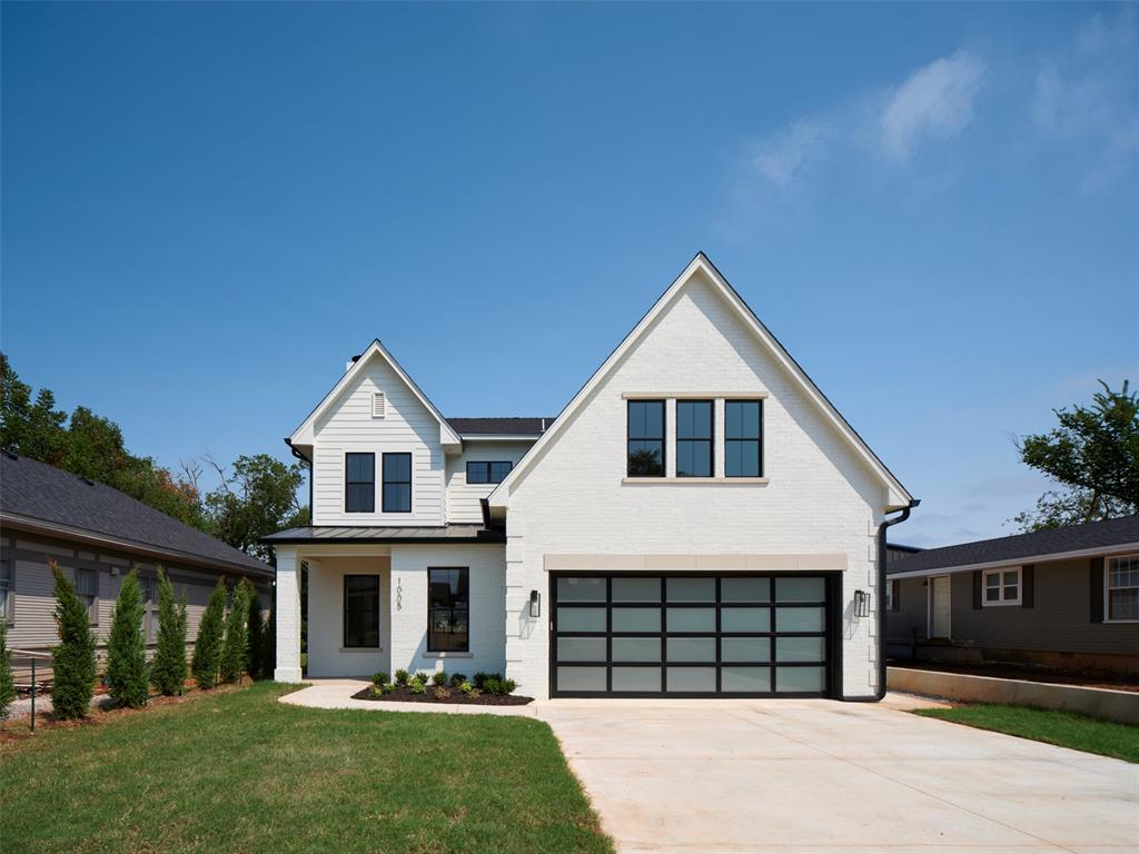 This beautifully designed 4-bedroom, 4.5-bathroom home combines modern luxury with everyday comfort. Step inside to an open-concept layout filled with natural light, featuring a spacious living room with a cast stone fireplace, an inviting dining area, and a high-end kitchen with premium finishes with a large island. A separate bar or coffee nook adds the perfect touch for entertaining or daily convenience. The primary suite is located downstairs, offering a serene retreat with an oversized soaking tub, large walk-in shower, and an expansive walk-in closet. Upstairs, you’ll find three additional bedrooms, each with its own ensuite bathroom. One of the upstairs bedrooms could be a versatile theatre or playroom to suit your lifestyle. Enjoy the outdoors with a large backyard, a covered patio with a gas log or wood-burning fireplace, and plenty of space for gatherings. The garage includes a storm shelter for peace of mind. Located near Western Avenue, top restaurants, highway access, Whole Foods, and Trader Joe’s, this home offers both convenience and luxury. Let's schedule your showing today!
