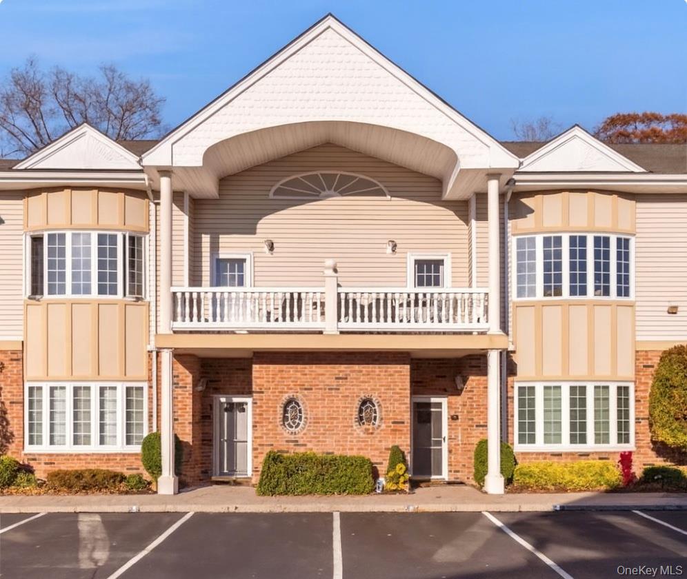 Welcome to carefree living in this beautiful top-floor condo in Amityville's desirable gated community of Village Estates.  Featuring two spacious bedrooms, the primary includes an en-suite and an additional full bathroom.  This home boasts 1243 square feet of living space that flows from room to room with fresh paint, brand new carpeting an lovely new window treatments!  Lovely peninsula kitchen that looks onto a formal dining alcove.  The living room has gorgeous high ceilings and is bright and sun soaked.  There is a balcony to take your morning coffee or watch the sunset.  Enjoy peace, privacy  an a maintenance-free lifestyle just minutes from shopping, dining, LIRR and the waterfront! There is an assessment on this property of $150 p/m.