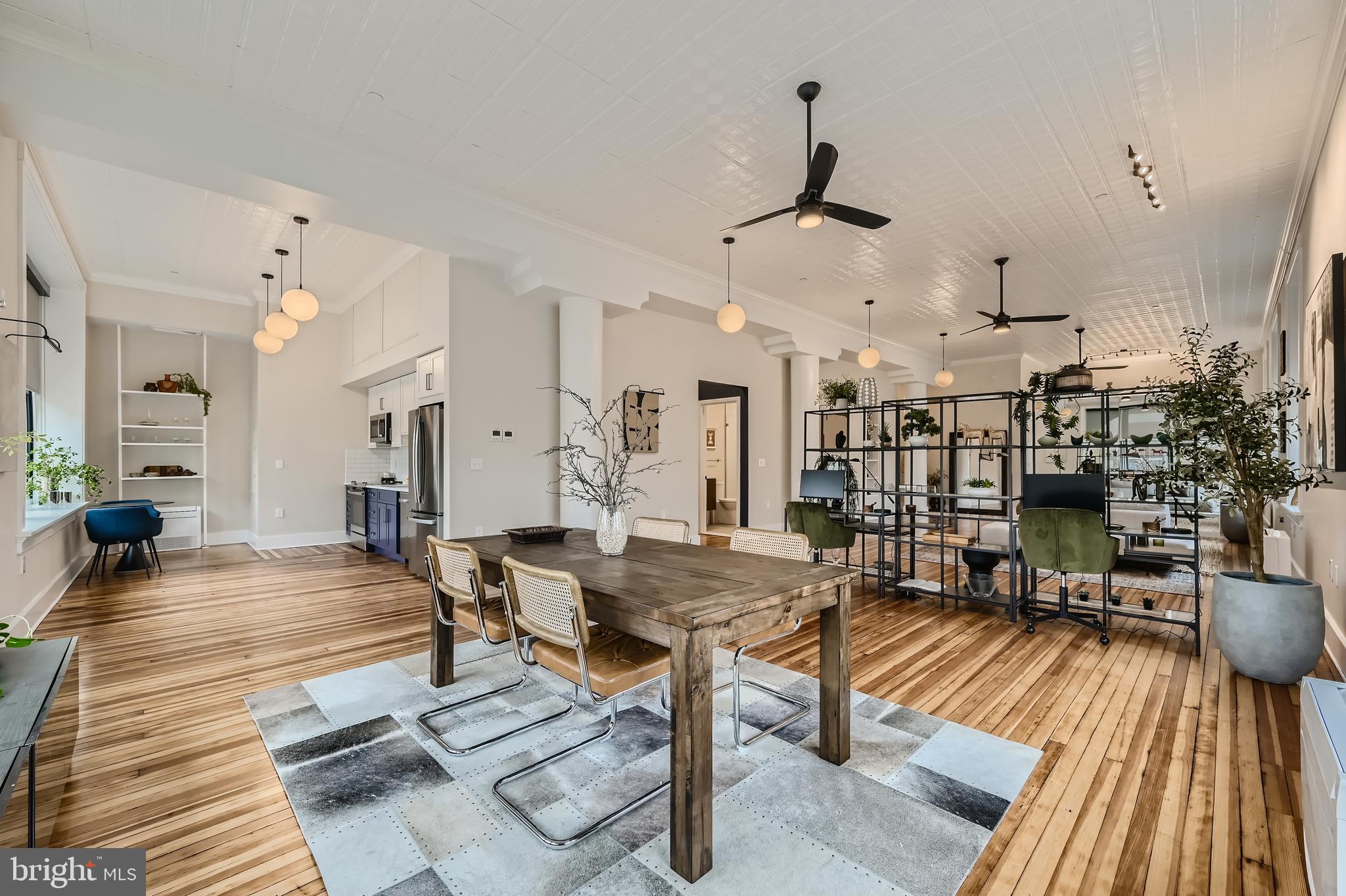 Unlike any other apartments in Baltimore!  Newly renovated Open Live/Work lofts.  If you are looking for expansive space – and something historically special – you owe it to yourself to visit the Crook Horner Lofts before you rent anywhere else. Located at the corner of North Howard and West Saratoga, the Crook Horner Lofts will bring 15 units of expansive open loft apartments to downtown Baltimore along with two lively street-level spaces. Built in 1890 for Crook Horner & Co. Plumbing Supplies, and later housing Pollackʼs Furniture and Rugs for many decades, 303 North Howard features soaring 14-foot ceilings, dramatic arched windows, and open floor plans. New York City-based B&B Urban worked with Baltimore-based the Civic Group to renovate these historic properties, honoring the buildingsʼ past while creating dramatic and unusually spacious live and work loft apartments.