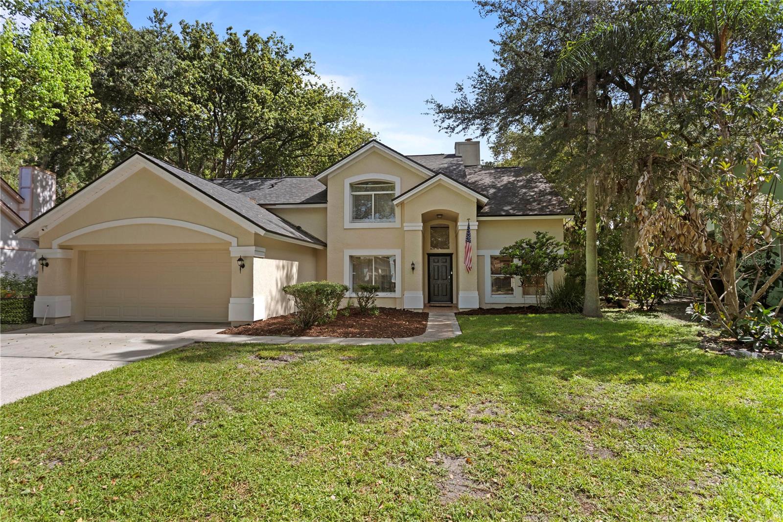 Under contract-accepting backup offers. SIGNIFICANT PRICE IMPROVEMENT!!! Welcome to this light-filled Tampa Palms home offering 3 bedrooms, 2.5 bathrooms, plus a separate, dedicated office. This lovely home is complete with 2,000 square feet, and a thoughtful layout designed for comfortable everyday living. Notable updates include a new roof (2024), new gas water heater (2024), fresh interior paint (2026), new pool pump (2025), removed popcorn ceilings throughout the home, new ceiling fans in all 3 bedrooms and updated flooring in several rooms giving the home a fresh, updated feel. The primary suite is conveniently located downstairs, as is the home office which provides the perfect space for working from home, hobbies, or quiet study. A separate laundry room adds everyday convenience.The open floor plan creates an easy flow between the kitchen and family room, where soaring ceilings and a cozy fireplace make the main living area feel both spacious and inviting. Natural light fills the home, enhancing its bright, welcoming atmosphere.Step through the sliding glass doors to enjoy a peaceful backyard retreat featuring a beautiful swimming pool with an updated screened enclosure (2026). Beyond the pool, a conservation area provides a serene view and added privacy, creating the perfect setting for relaxing, entertaining, or enjoying Florida living year-round.Located in the highly desirable Tampa Palms neighborhood, this home offers access to a master-planned New Tampa community known for its natural surroundings, 5 parks, recreation (including community pool, pickleball and tennis courts), dining, and convenient access to major corridors. This is a wonderful opportunity to enjoy comfort, privacy, and an exceptional Tampa Palms lifestyle.