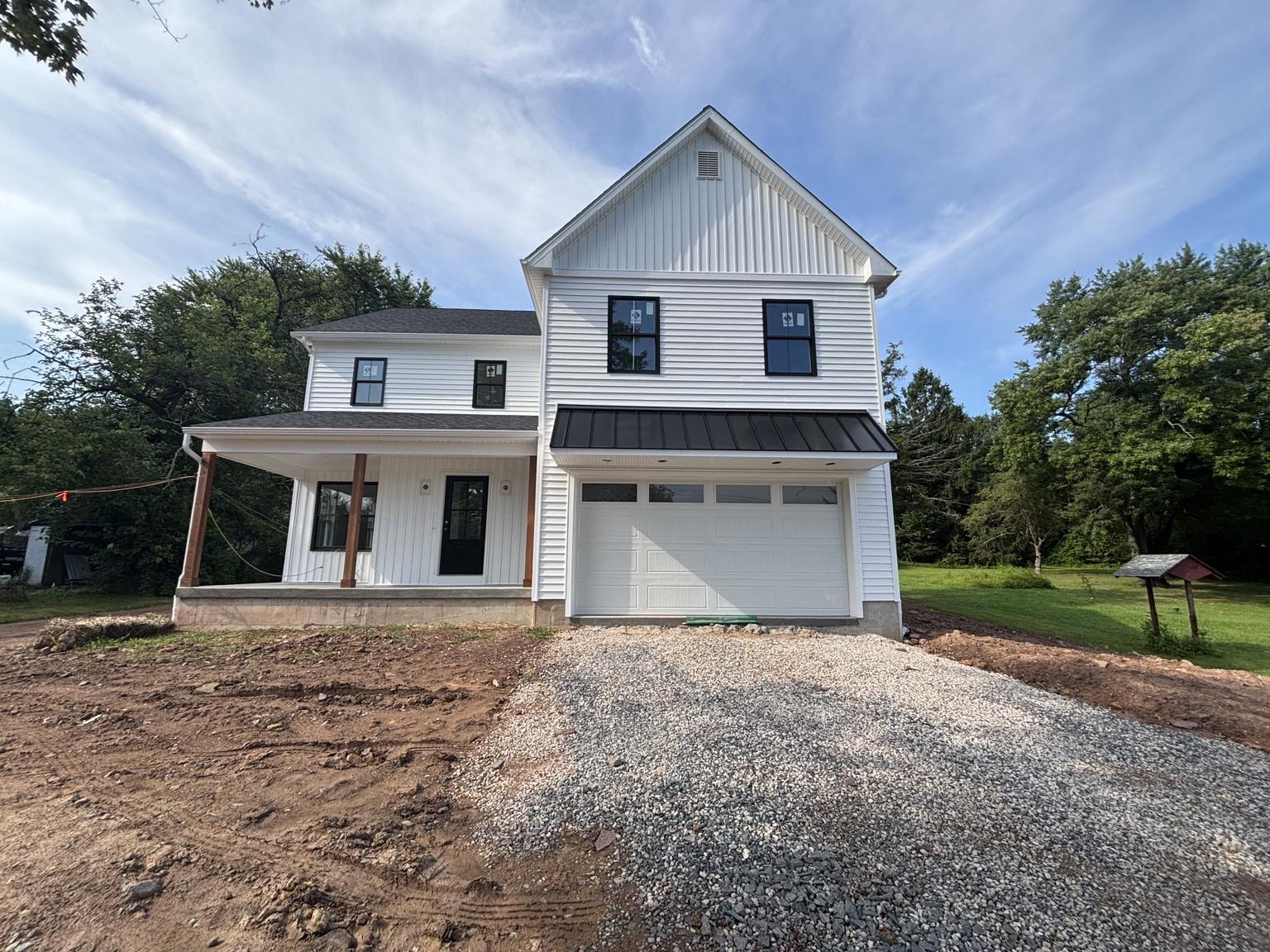 New Construction in the Owen J Roberts School District. Why wait 8-10 months for new construction when you can close in 30 days!! Welcome to 780 E Cedarville Road, an exceptional brand-new modern farmhouse nestled on nearly one acre of level land in the desirable North Coventry Township within the award-winning Owen J. Roberts School District. Designed for today’s lifestyle, this home blends timeless craftsmanship with modern luxury, offering over 2,700 square feet of finished living space plus an additional 1,100 square-foot unfinished basement ready for future customization. Step inside to find 9-foot ceilings, wide-plank hardwood flooring, and abundant natural light streaming through 20+ energy-efficient windows. The open-concept floor plan is anchored by a gourmet kitchen featuring stainless steel appliances, an oversized island, quartz countertops, and elegant finishes perfect for both everyday living and entertaining. Upstairs, retreat to your spacious primary suite complete with a private sitting area and his-and-hers walk-in closets. The en suite bathroom offers spa-like comfort with tiled floors and a custom shower. Three additional large guest bedrooms, a full hall bath, and a convenient laundry area complete the second floor. A first-floor office (or optional 5th bedroom) provides flexibility for work-from-home or guest accommodations. Enjoy peaceful mornings on the expansive front porch, evenings on your private backyard, and plenty of room for outdoor entertaining. Located just across from Bellewood Country Club with golf course views, and moments from Route 422 and Route 100, this home offers easy access to major commuting routes, shopping, dining, and entertainment in Pottstown, Limerick, and Phoenixville while still providing a serene suburban setting. Experience the perfect combination of luxury, comfort, and location in this stunning new construction, a true standout in North Coventry Township. We are in the final stages of finish work and the home should be completed in the next couple of weeks. Please note that the lighting in the photos is AI-generated.  Contact Mike D for more details.